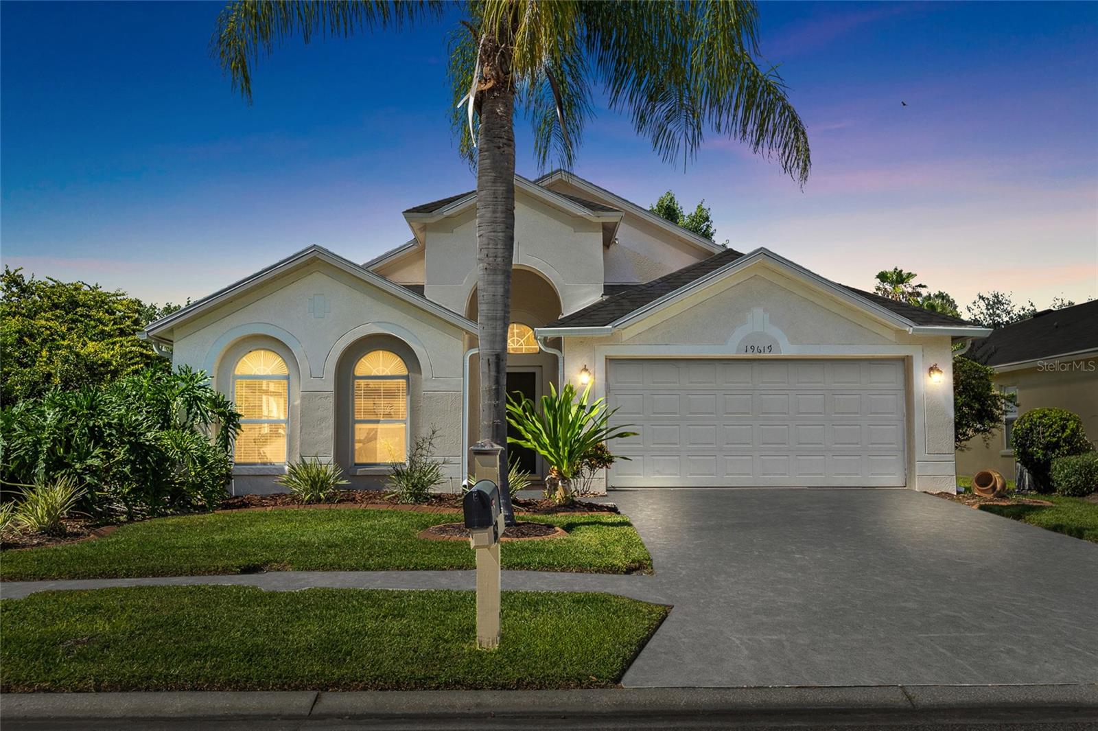 Welcome to this beautifully updated home in the highly desirable Oakstead Community! Offering a blend of modern upgrades, outdoor enjoyment, and an unbeatable location, this property is truly move-in ready.

Recent improvements provide peace of mind, including a new roof and gutters (2024), new garage door (2025), AC replaced in 2022, water heater (2022), and a Culligan water softener with reverse osmosis water filtration system (2021). Inside, the home features updated kitchen and bathroom countertops (2021), kitchen appliances (2021), and a beautifully remodeled primary bathroom shower completed in 2023.

Outdoor living shines with a spacious 20' x 10' screened room added in 2021, perfect for relaxing or entertaining year-round. The backyard has been enhanced with fresh landscaping and a putting green installed in 2025, creating a private outdoor retreat.

Located in the sought-after Oakstead community, residents enjoy access to a community clubhouse, amenities, and convenient proximity to FL-54, providing easy access to shopping, dining, entertainment, and everyday conveniences. This exceptional home combines thoughtful updates, attractive outdoor spaces, and a prime location, ready for its next owner to enjoy.