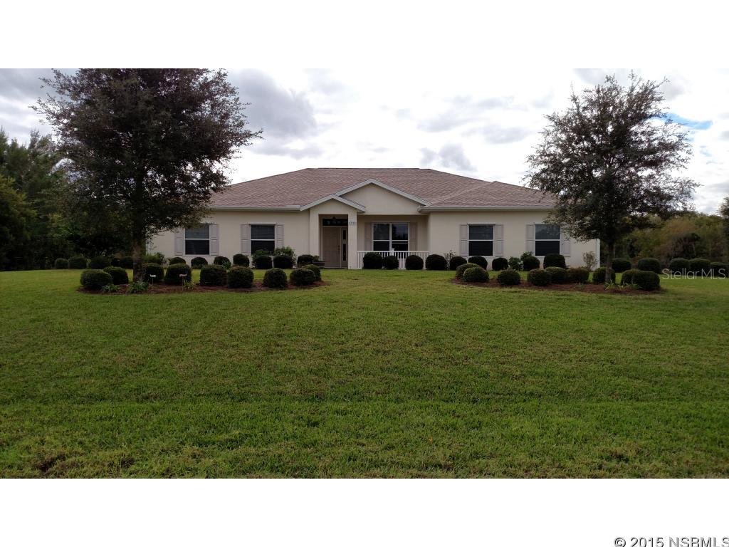 Under contract taking backups. Great floor plan; 4 bedroom 3 bath 2340 sq. ft. concrete block/stucco home with 2784 sq. ft. hangar/shop on paved taxiway at Massey Ranch Airpark.  Split plan is open and airy, has 9'4" ceilings, one-coat plastered walls and ceiling fans throughout.  Nice kitchen with GE stainless steel appliances, gas range, electric convection oven and over the range convection/microwave, premium honey maple cabinets, dining nook and formal dining room.  The master bedroom, guest suite/office and family room all open on to large screened back porch.  The master bath has separate toilet room, double sinks, large shower with dual shower heads and jetted tub.  Gas water heater services master bath and kitchen.  Electric water heater services the two other bathrooms, water heaters can be cross fed if needed.  Floors are tile and carpet.   Laundry room, water softener, high efficiency heat pump, city water, septic LP gas, cable and satellite.  The house and hangar have a security system, cutter drainage system, hurricane shutters and both are wired for a generator.  Hangar: Steel and lumber construction with concrete board /stucco siding 40' x 56' Hangar has two 40X 12 electric bi-fold doors.  36'6 X 11'6 garage area has 9ft wide door, a bathroom with shower and utility sink.  The hangar has a metal roof and three RV hook ups on the outside, Direct access to paved taxiway and 4360' paved lighted runway.   The East Coast Regional Rail Trial (multi-use trail) is .6 miles from the house. ;Water: City