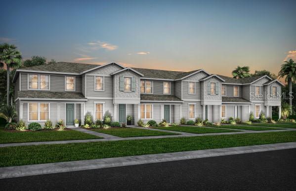 Under Construction. EverBe is a new master planned community where convenience and connections combine to create a new standard for home. Located in Orlando with quick access to 417 & 528, this lifestyle community will offer miles of pathways & trails, wi-fi-enabled green spaces, unique outdoor recreation areas, a fitness center, a clubhouse complex with resort pool, 2G internet, and a waterfront amenity and town center. Get excited for EverBe - everything home should ever be! 

 Our new construction Foxtail Interior Unit townhome features 3 bedrooms, 2 full bathrooms, a powder room, an open concept kitchen, café and gathering room, a private courtyard, a 2-car rear-facing garage and our Move-In Ready package with includes a refrigerator, washer, dryer, and 2” faux wood blinds. The first floor is ideal for entertaining, featuring a spacious gathering room, café and kitchen, with a large center island, storage pantry, Tilden White cabinets, a decorative tile backsplash, Lyra quartz countertops and Whirlpool stainless-steel kitchen appliances – including a refrigerator. A powder room and laundry on the first floor add to the thoughtful convenience. Enjoy entertaining loved ones from your private, fenced rear courtyard. After a long day, retreat upstairs to your private oasis. The Owner's Suite features a spacious walk-in closet and en suite bathroom with a double sink Lyra quartz-topped vanity, private water closet and a walk-in shower. Two additional bedrooms, the secondary bathroom and extra storage offered by a linen closet are on the opposite side of the second floor, offering privacy and space for everyone. Professionally curated design finishes for this popular Foxtail townhome include window blinds, all appliances, upgraded Elkins White cabinetry with quartz countertops, designer tile accents in the kitchen and bathrooms, Wood-Look Oceanfront Luxury Vinyl Flooring throughout Main living areas, Brescia Blanco Ceramic flooring throughout bathrooms, and soft, stain-resistant, Shaw brand carpet in the bedrooms and second floor living areas, and so