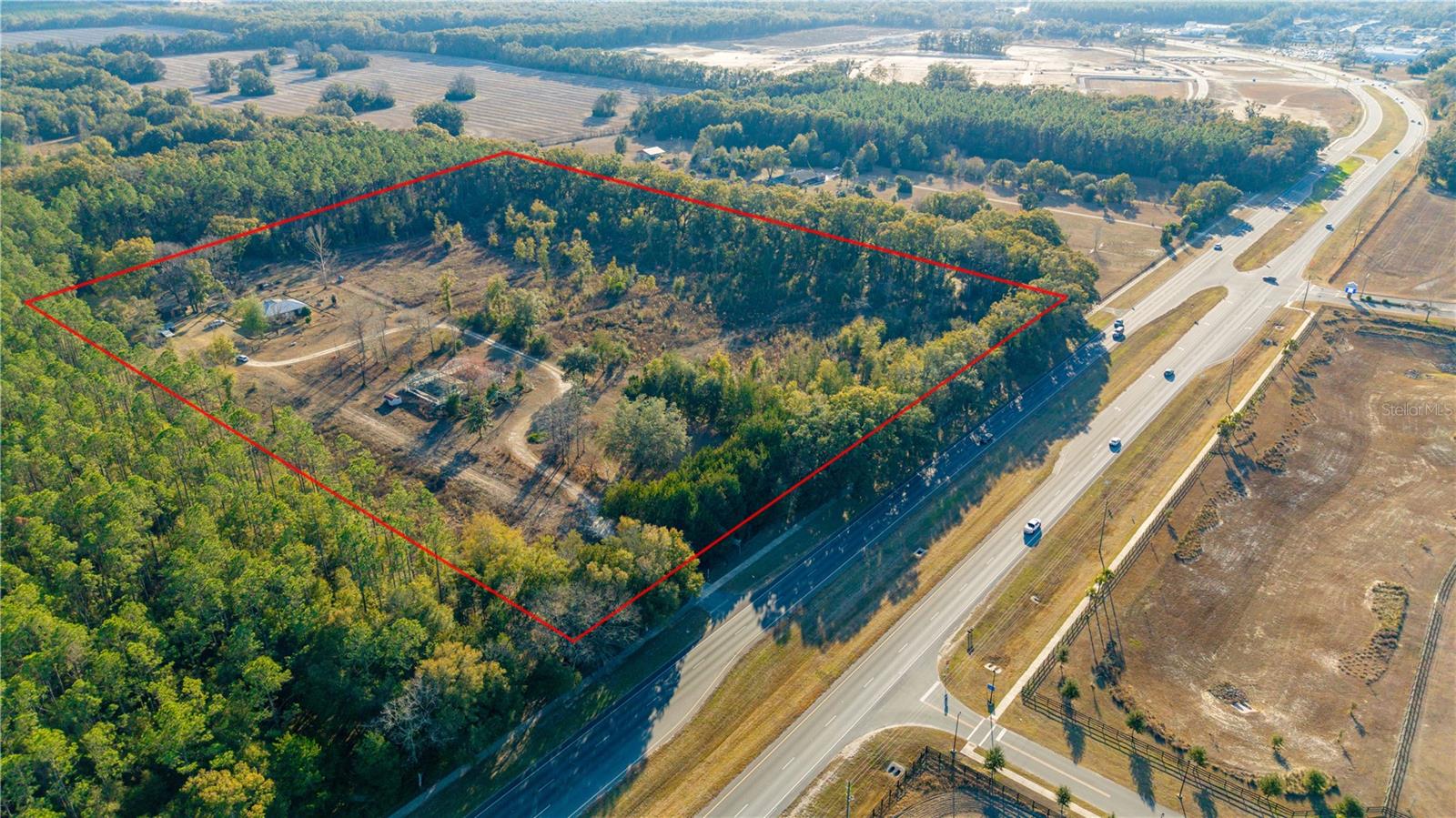 Under contract-accepting backup offers. PRIME LOCATION! 14.83 Acres located on Newberry Road with approximately 741 ft of Newberry Road frontage/State Road 26 Highway. Newberry is one of the fastest growing residential and commercial destinations. This large parcel is located at the entrance of the City. This site is ideally suited for a commercial development, medical facility, apartments, restaurant, hotel, shopping center or residential subdivision. Parcel located near the Newly built Publix and additional commercial Development under construction. Newberry is the NEW HOT SPOT of Alachua County. Buyers are responsible for confirming zoning.