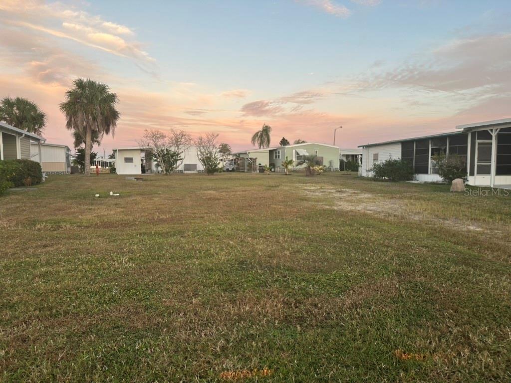 Build your Florida home on this interior lot located in the well-established 55+ waterfront community of Harbor Cove. This lot offers a great opportunity to create a custom home in a relaxed, resident-owned setting. Building packages are available, providing a convenient path from purchase to completion. Harbor Cove features a wide range of amenities, including a marina with optional dock space, clubhouse, swimming pool, fitness center, and an active calendar of social events. Ideally situated near shopping, dining, beaches, and historic downtown Venice, this interior lot is well suited for either seasonal or full-time living.