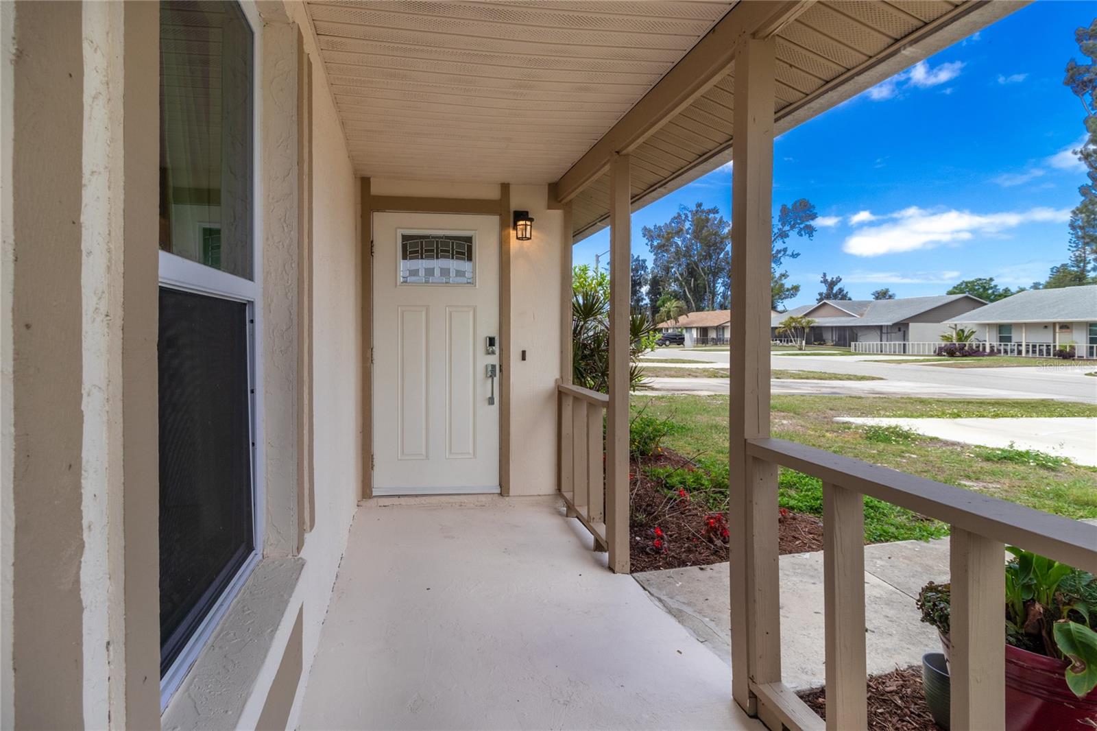 Half (one side) of a rare 3BR/2BA duplex — fully remodeled and move-in ready. Located just 10 minutes from Anna Maria Island in flood zone X (no flood insurance required). No sign in front. If you're tired of the cookie cutter flips with gray paint, white or gray kitchens, and fake floors, this property is what you've been waiting for! Clean, smoke free, and pet free property. Completely renovated in 2023-2026 with major system upgrades including a new roof with wind mitigation, impact glass windows and doors, new hot water heater, updated plumbing, electrical, and lighting throughout, fully new GORGEOUS kitchen and two new full baths, plus fresh interior and exterior finishes. The 2023 redesigned kitchen is a showstopper! The layout was redesigned in 2023 so you face the new patio door with water view from the unique Vermillion red double sink instead of the wall. This chef's delight of a kitchen is unique in the neighborhood (or any other!) and features the following since 2023 or later -- hickory cabinetry, spacious Corian countertops, handmade talavera tile backsplashes, new 2026 garbage disposal, new stainless steel appliances (Whirlpool freezer-bottom fridge with icemaker, Whirlpool self-cleaning oven with hood and ceramic cooktop, new 2026 Samsung dishwasher), filtered drinking water at the sink, and generous storage (lazy Susan, pantry, ample cabinets, etc.). Both bathrooms have been fully renovated with tiled showers with built-in storage niches, modern vanities, new sinks, low profile toilets and more. Interior improvements include new handmade imported Saltillo flooring throughout, recessed lighting, ceiling fans, updated drywall, fresh paint, custom vertical blinds and window treatments, and custom closet systems in all bedrooms. Additional upgrades include new impact glass windows and patio door with screens, new front door, Electrolux washer and dryer, gutters and downspouts, new hose bib and water shutoff replacement, and a recently serviced HVAC system with added UV light and Remie-Halo device installed to clean and protect air quality. Enjoy indoor-outdoor living with a private patio overlooking a peaceful pond that attracts local wildlife, along with fresh landscaping including drip irrigation, a butterfly garden and a blooming lemon tree. Low-maintenance living with low HOA covering lawn care, exterior maintenance, exterior insurance, roof, sewer pipe, driveway and more — reducing overall due of homeownership. Conveniently located near Palma Sola Park, shopping, dining, and just minutes to the beaches, SRQ airport, IMG Academy, and easy access to Sarasota, St. Pete, and Tampa.  HOA rules require a long-term lease (12 month minimum); this unit is ONE HALF of a duplex, NOT both sides. A full duplex (both sides) due about $400,000 in this area and the units will not be in the same excellent, remodeled condition as this property. Well-maintained, light-filled, and move-in ready. Seeing is believing!