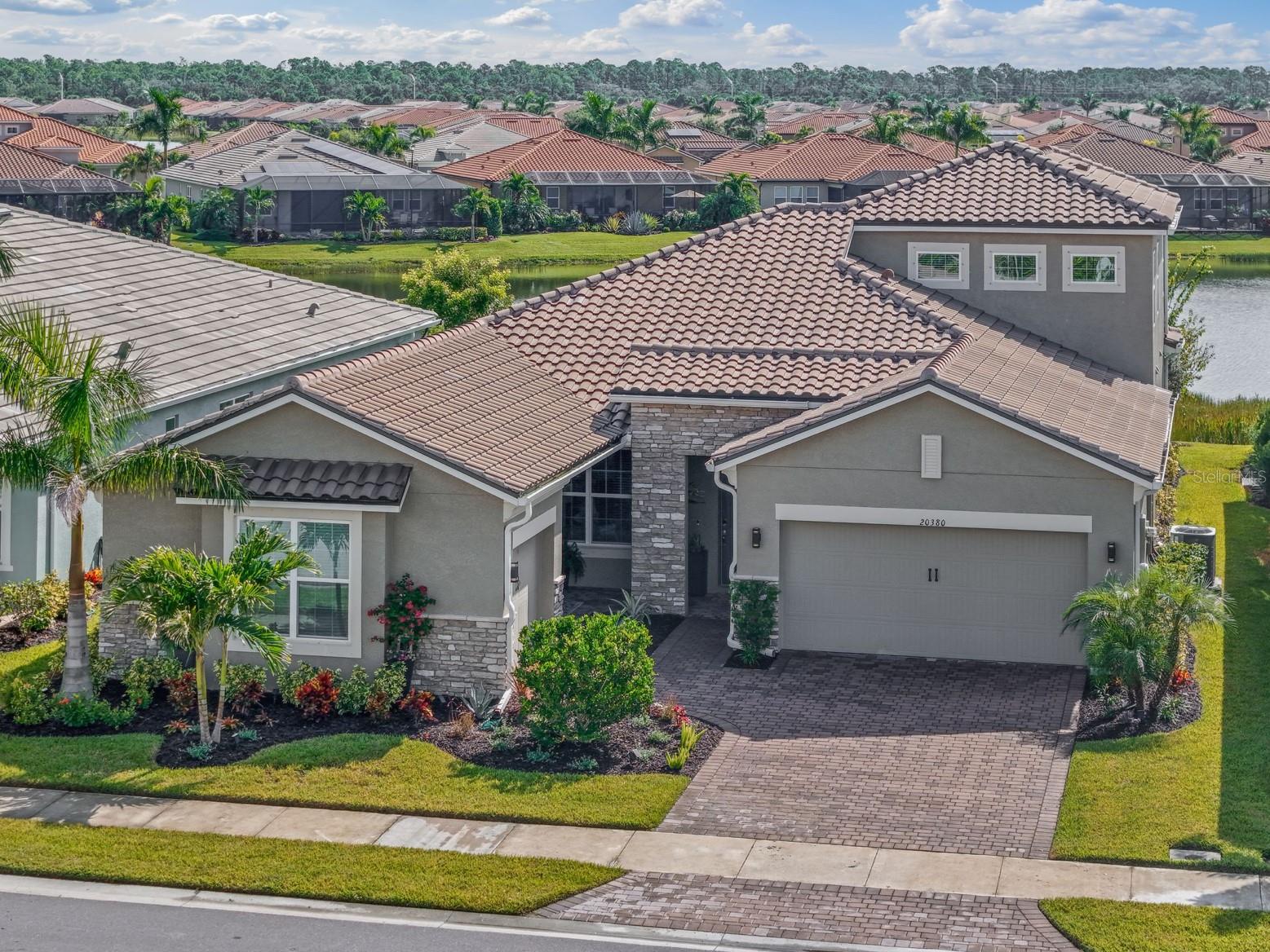 A beautifully maintained, 1½-story model-like home offering 5 bedrooms, 4 full bathrooms, and nearly 3,300 square feet of thoughtfully designed living space in stunning Venice.
They say there are four must-haves you can never change: location, view, home size, and storage space — and this exceptional property checks every box.
Prime Location
Ideally situated near the vibrant new downtown area of Wellen Park, you’re just minutes from dining, shopping, entertainment, and community events. Sports fans will love being close to CoolToday Park, the Spring Training home of the Atlanta Braves.
Unmatched Waterfront View
Enjoy peaceful mornings and relaxing evenings overlooking a serene pond with a calming fountain feature from your oversized covered lanai — the perfect backdrop for entertaining or unwinding in your private outdoor oasis.
Spacious & Flexible Floor Plan
This sought-after Nantucket II floor plan with Tuscan elevation offers ideal main-floor living, including:
• A large owner’s suite with a spacious master bath retreat
• Three additional first-floor bedrooms
• Two additional full bathrooms
No basement? No problem. Upstairs you’ll find an impressive 600-square-foot private living suite complete with a full bathroom, bedroom, and expansive living area — ideal for a guest retreat, media room, or the ultimate man-cave.
Designed to Impress
Enter through a charming front porch courtyard seating area that welcomes you and your guests in style. The custom-designed flex room entry makes a striking first impression and flows seamlessly into the expansive open-concept great room.
The executive kitchen is truly the heart of the home, featuring:
• A massive 9-foot center island
• Abundant counter space
• Beautiful cabinetry
• Extensive storage throughout
The open layout effortlessly connects the great room to the oversized covered lanai, blending indoor and outdoor living perfectly.
Additional Highlights
• Coveted 3-car garage with finished coated flooring
• Nearly 3,300 sq ft of living space
• Four full bathrooms
• Exceptional storage throughout
• Meticulously maintained, move-in-ready condition
This is more than a home — it’s a lifestyle property offering luxury, flexibility, and one of the most desirable locations in Venice.
Schedule your private showing today and experience waterfront living at its finest. Not in a flood zone.