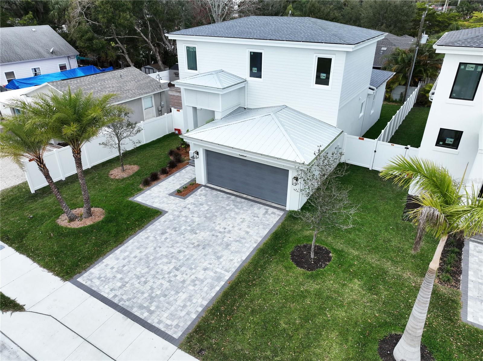 Virtually Staged. New construction and under $1m in the sought after Southside school district this is very rare, but you have found it right here and your opportunity is knocking.

Custom Luxury Living Near Downtown Sarasota! Welcome home to this exquisite, 4 bed 2 and a half bath custom-built residence designed by renowned Piper Navy! This two-story traditional model offers unparalleled craftsmanship and exceptional amenities just moments from Sarasota's vibrant core. Step inside to discover a truly thoughtful design, featuring soaring 9'4'' ceilings and elegant crown molding. The gourmet kitchen is a chef's dream, boasting an entertaining island, all-wood cabinetry, and stunning quartz countertops. Beautiful wood flooring flows seamlessly throughout the entire home. Constructed with block on both floors and featuring upgraded underground electric service, this residence is built for lasting quality. Enjoy peace of mind and abundant natural light thanks to custom hurricane PGT Florida Impact Rated windows and doors. The floor plan includes a gorgeous master suite on the ground floor, with a beautiful ensuite bathroom with carrara tile flooring and free standing bath to wallow the night away in after a hard day, there is also a versatile loft, with ample storage space,  Upstairs is a further three guest bedrooms with luxurious bathroom and a bonus landing area that can be utlized and made into an open plan office space, should you need to work from home.  Relax or entertain guests on the expansive rear concrete lanai with fenced in mature private gardens. There is also room to build a pool,should you wish to in the future The exterior is completed with an irrigation system, St. Augustine grass, and a paver front driveway, providing beautiful curb appeal.This property offers an unbeatable Sarasota lifestyle! With the boutique area of Hillview around the corner ,Siesta key  beach and You are less than 5 minutes from downtown Sarasota's beautiful Marina, cultural attractions, and fine dining. Less than 10 minutes to reach the world-renowned St. Armands Circle and the pristine sands of Lido Beach, offering upscale shopping and entertainment, you are in the best central location you could ask for.