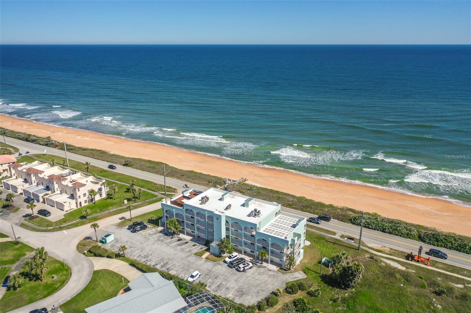 Experience elevated coastal living in this stunning 3-bedroom, 2-bath luxury penthouse condo spanning 1900 sq ft with a private rooftop 1400 sq ft decked patio for additional outdoor living space located directly on iconic A1A with breathtaking panoramic sunrise views of the Atlantic Ocean and rooftop sunset views over the Intracoastal Waterway. Completely remodeled with no expense spared, this one-of-a-kind residence combines upscale finishes, modern elegance, and the ultimate beachside lifestyle.

Step inside to discover an expansive open-concept floor plan featuring gorgeous hardwood floors, designer upgrades throughout, and a massive chef’s kitchen perfect for entertaining. The oversized kitchen boasts premium finishes, abundant cabinetry, and a show-stopping illuminated sitting bar that creates the perfect gathering space for guests and family alike.

The grand primary suite is a true retreat with generous space, spa-inspired luxury bathroom, and tranquil coastal ambiance. Floor-to-ceiling views and natural light showcase the beauty of oceanfront living from nearly every angle.

One of the most exceptional features of this penthouse is the private 1400 sq ft rooftop patio complete with decking — an incredible space for entertaining, relaxing, sunbathing, or enjoying unforgettable sunrises over the Atlantic Ocean.

Nestled in the serene and private enclave of Ormond by the Sea, this property offers the best of Florida coastal living—only 5 minutes from downtown Ormond Beach, a short drive to vibrant Daytona Beach, 45 minutes to historic St. Augustine, and just an hour from Orlando’s world-famous amusement parks and international airport.

Whether you are searching for a luxury primary residence, vacation home, or premier investment property, this fully upgraded oceanfront penthouse delivers sophistication, comfort, and unbeatable views in one extraordinary package.
