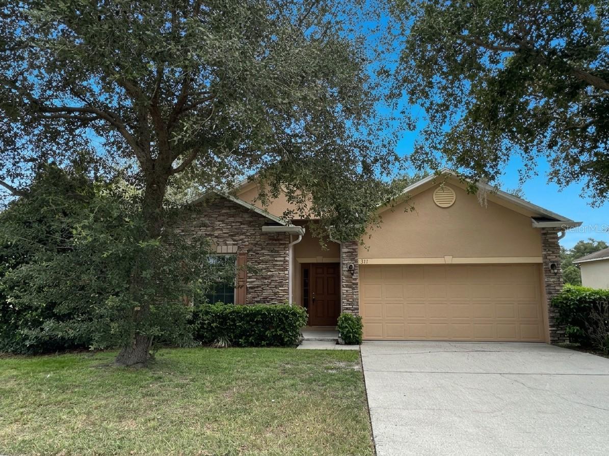 Spacious three bedroom, two bathroom single family home in Apopka. 2 car garage. Backs up to a pond. Split floor plan with open living space. Freshly painted inside and brand new carpets installed throughout. Interior laundry room with washer and dryer included. Lawn/shrub care a tenant responsibility. Move-in ready.