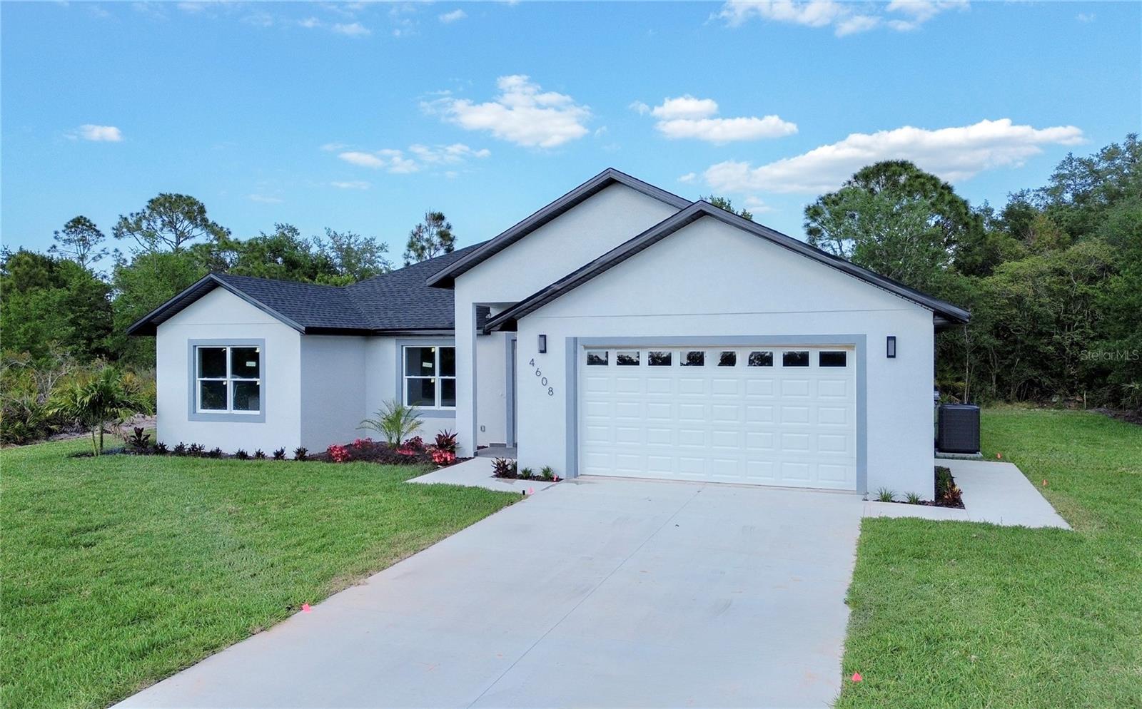 Stunning 3BR/3BA home in sought-after Sun 'N Lake, Sebring. Vaulted ceilings, open-concept layout & luxury vinyl plank flooring throughout. Chef-inspired kitchen w/ quartz countertops & stylish backsplash. High-end finishes extend to bathrooms & window sills. Owner's suite features premium tile & frameless glass shower doors. Additional bedrooms have ample closet space & natural light — ideal for families or rental income. Covered lanai w/ fans & lighting, 2-car garage w/ epoxy floors, laundry room w/ utility sink & full irrigation system. MOTIVATED SELLER — EXCEPTIONAL INVESTMENT OPPORTUNITY. QUARTZ COUNTERTOPS THROUGHOUT. MOVE-IN READY. TURNKEY FOR AIRBNB OR LONG-TERM RENTAL. HIGH-DEMAND SEBRING CORRIDOR. Schedule your showing today!