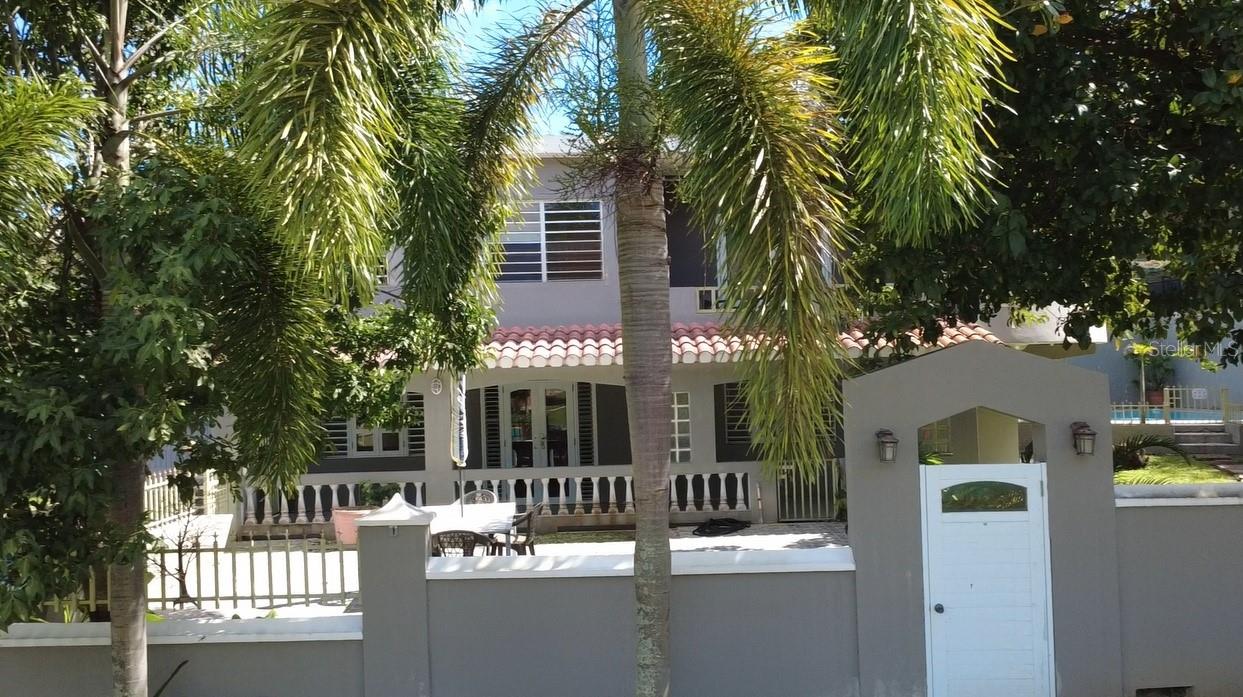 This beautiful 3 bedroom, 2 bathroom home in Villa Borinquen is paradise. In a quiet neighborhood, private, with a completely fenced yard. The yard is tastefully landscaped with a patio and a covered balcony. Not only this, but there is a gazebo as well next to the pool, for barbequing, and relaxing. Off street, gated parking with a large detached storage area.

Stepping through the front door you will find a spacious, open living area. Living room, dining and kitchen flow together with arched doorways and windows to complete the ambience. AC throughout. One bathroom downstairs and one up. A spiral staircase leads upstairs to the three bedrooms. There is an extra small balcony off of the foyer on the second level where you can catch the breezes and enjoy the view. Beautifully furnished, and furnishings are negotiable. Well maintained inside and out! This approx. 2,000 squarefoot remarkable concrete 3 BR/2 BATH single-family residential property on approximately 1/3 of an acre is Titled and is zoned for Residential Use.


With mid island convenience you can access the north or south sides  of Vieques in no time at all. Start living your dream today!!