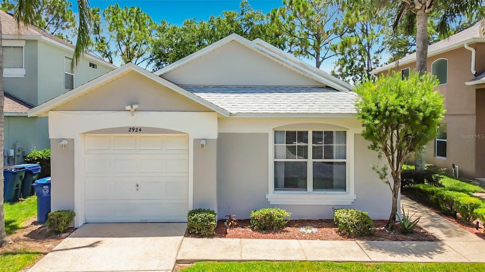 Discover the perfect blend of resort living and total flexibility! Offered fully furnished and completely move-in ready, this stunning 3-bedroom, 2-bathroom residence is an ideal primary home, vacation escape, or a flexible rental property. The current owner maintains it as an active Airbnb, offering a rare opportunity to either pack your bags and move right into a beautifully decorated house or step into an established, income-producing asset. Step inside to an inviting open layout that boasts recent premium upgrades throughout, featuring white stone countertops installed in the kitchen and both bathrooms (September 2022), a complete HVAC system replacement (2021), and a spectacular full kitchen remodel with custom cabinetry completed in April 2025. The bright living space flows effortlessly out to a private, screened-in pool equipped with a newer pool heater (December 2023), offering scenic golf course views and no rear neighbors for ultimate privacy. Peace of mind comes included with a brand-new roof replaced in August 2024. Located within the secure, 24-hour guard-gated Southern Dunes Golf & Country Club, you or your guests will enjoy top-tier amenities including a championship golf course, clubhouse, fitness center, and tennis courts. Best of all, you are just a short, convenient drive from world-class Orlando theme parks like Walt Disney World, Universal Studios, and Legoland. Low HOA fees, nearby shopping, and unmatched location flexibility make this meticulously maintained, turnkey property a must-see.