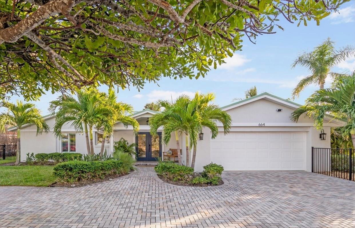 Experience understated elegance in this contemporary coastal 5BR/4BA home located in the esteemed Key Royale community on Anna Maria Island. Thoughtfully designed and impeccably finished, this residence exudes quiet luxury from the moment you step inside. Soft natural light, refined materials, and serene water views create a sense of calm throughout the open concept living spaces. 

The gourmet kitchen serves as the heart of the home, showcasing an oversized island, custom cabinetry, premium GE Monogram appliances, an induction cooktop, and sleek stone surfaces —perfectly blending beauty and function. The adjacent living and dining areas flow effortlessly toward the outdoors, where expansive hurricane rated glass doors frame tranquil sunset views down a wide canal. 

The primary suite is a private retreat with lanai access and a spa-inspired bath featuring elegant finishes. Four additional bedrooms, two ensuite, offer flexibility for guests, extended family, or a dedicated office, each echoing the home’s modern coastal sophistication. 
Designed for effortless indoor-outdoor living, the residence features a heated, saltwater pool and a screened lanai ideal for quiet mornings, relaxed gatherings, and evening breezes by the water. The property also boasts a private dock and 12,000 lb. boat lift, and offers direct boating access to Tampa Bay, the Intracoastal Waterway, and the Gulf—perfect for boating adventures, jet skis, kayaking and paddle boarding.

Set in a coveted neighborhood known for its privacy and charm, this Key Royale home offers a rare combination of contemporary design, serene waterfront views, and the refined simplicity of quiet luxury—just minutes from Anna Maria Island’s world renown beaches, shops, and dining.