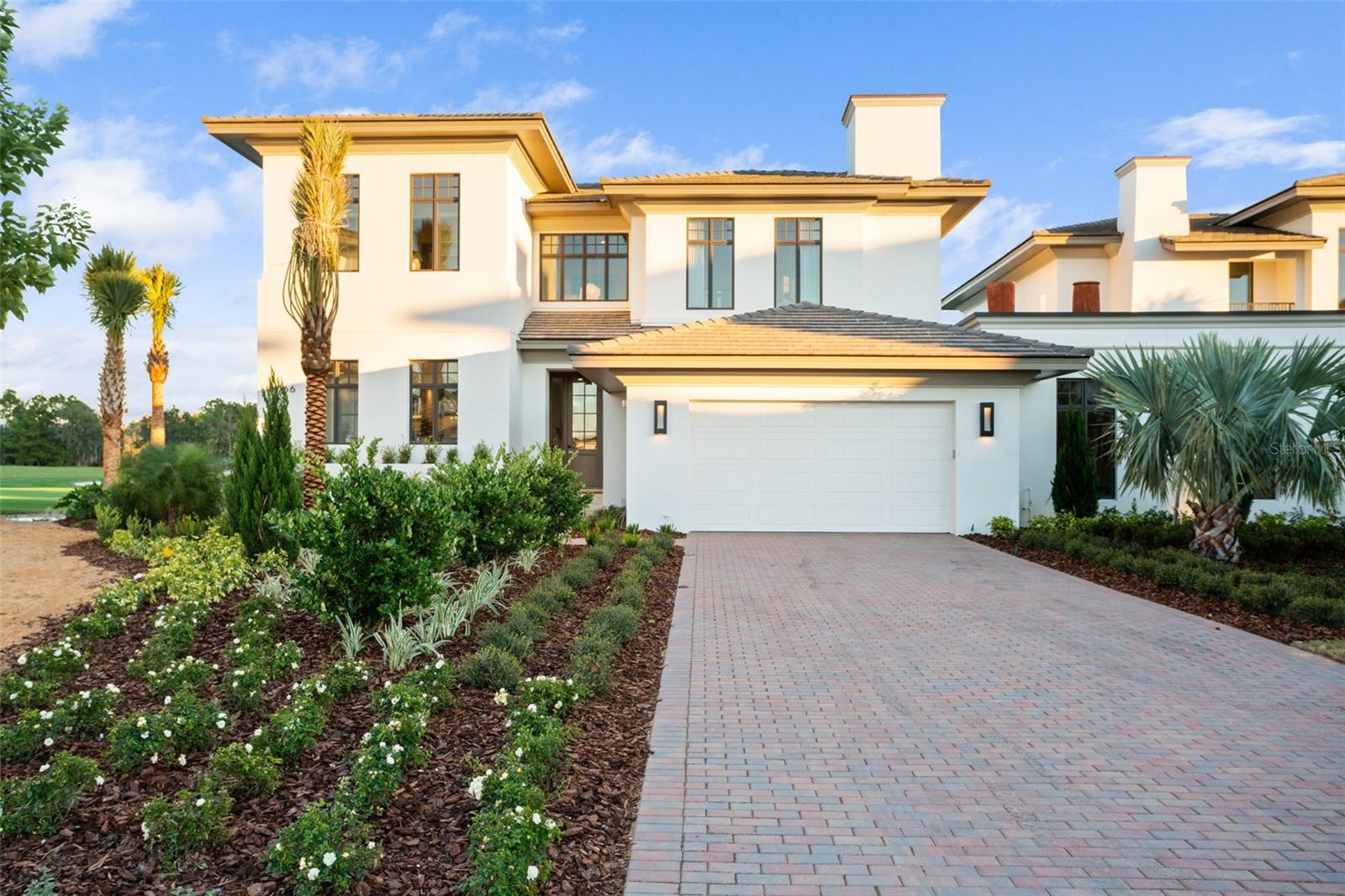 Fully furnished - turnkey, including the full package of Ritz-Carlton housewares, TV's, linens, decor and furniture. This private, gated enclave of luxury living has redefined Orlando as a Destination. The privilege of ownership offers a level of luxury lifestyle blending the legendary service of the Ritz-Carlton brand that revolves around you, with sophisticated comfort and unparalleled solitude; where rejuvenation comes naturally. Indulge in a 360 degree approach to well-being and serene luxury. Available for immediate occupancy, the 3 bedroom Arcadian floor plan residence is located on a premium lot, with breathtaking golf and water views with an organic modern design and ultra premium finishes. The kitchen offers Subzero and Wolf appliances, including wine refrigerator, and hidden pantry. The primary suite is located on the first floor with access to the pool deck, and includes 2 walk-in closets and a luxurious marble adorned spa-like bathroom. The remaining 2 guest suites are upstairs, with access to the oversized balcony with captivating views. Every element of The Residences’ design and the amenities are driven by the needs of the discerning buyer looking for an exceptional experience and a lifestyle of comfort, privacy and casual elegance. Enjoy true lock and leave, maintenance free living compliments of the Home Owners Association dues covering exterior maintenance and insurance. Ownership also includes access to private Residents only Club House, offering Concierge services, fitness, sauna, pool, billiards room, summer kitchen and indoor/outdoor dining and living. Owner's will also have the opportunity to join The Ritz-Carlton Grande Lakes membership program which offers access and charging privileges throughout the resort. Now is the time to take advantage of a limited offering in which you can enjoy the many comforts of a private home with all of the splendor of an estate, situated on a sprawling nature-scentric property that puts everything in reach.