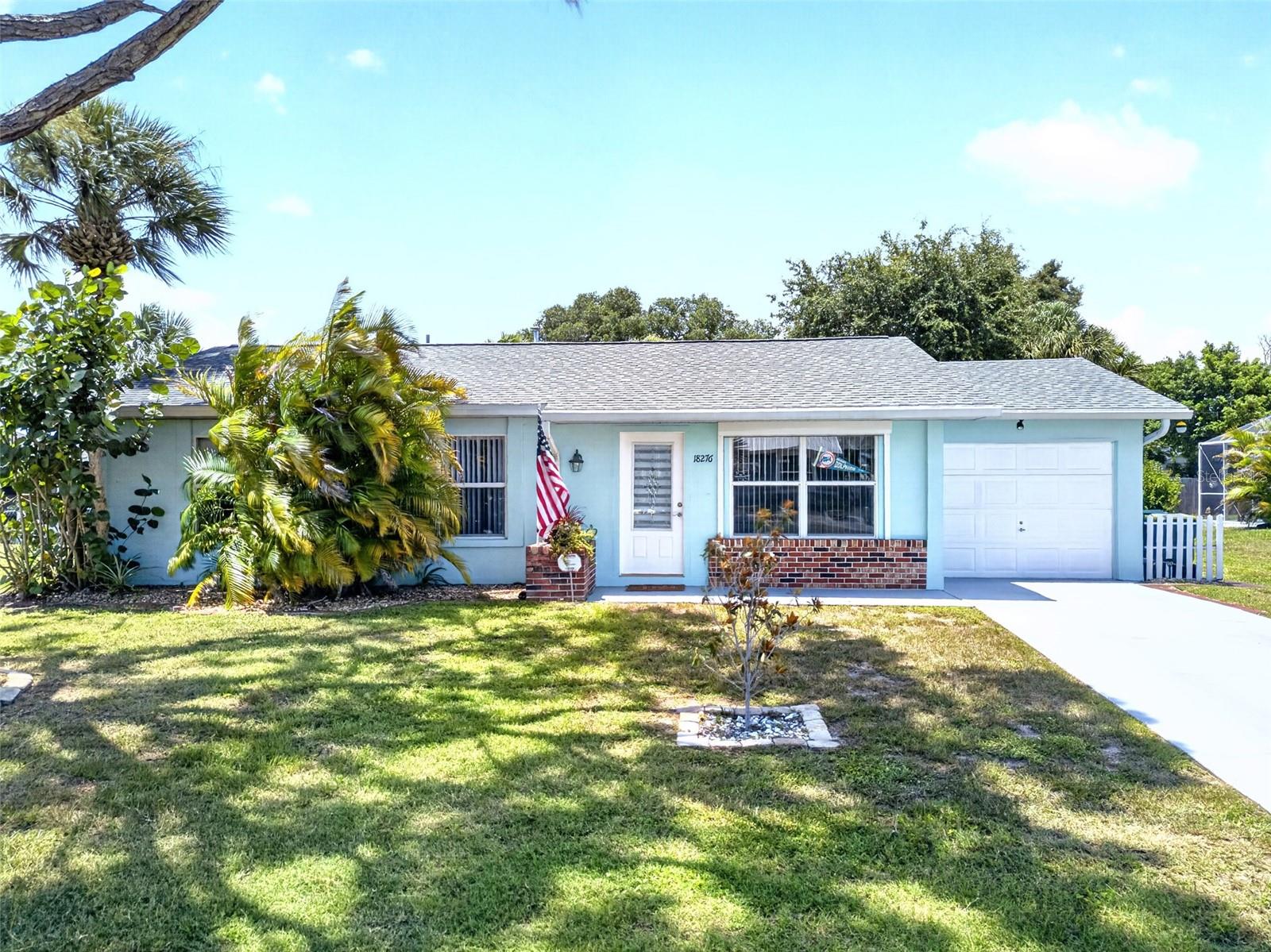 CHARMING 3 BEDROOM, 2 BATH, 1-CAR GARAGE POOL HOME IN PORT CHARLOTTE! Front patio leads into a thoughtfully designed space, with a newer roof (2023), laminate flooring throughout, and a neutral palette that fills each room with natural light. Bright living room flows seamlessly into the dining and kitchen area, creating an inviting layout perfect for hosting. Galley kitchen is both functional and accommodating, featuring white cabinetry, a convenient pass-through window to the pool area, and a unique garage door accented with stained glass. Retreat to the primary suite, complete with a large walk-in closet, an ensuite bath, and slider that leads you straight to the lanai. Two additional bedrooms are well-appointed and share a guest bath, offering plenty of space for everyone. Outside, the screened and covered lanai serves as your personal tropical oasis. The heated pool ensures year-round enjoyment. Beyond the pool, the expansive yard is framed by lush landscaping and includes a handy storage shed with tie down straps for all your outdoor gear. An additional highlight includes a portable generator with a permanently installed, water-resistant electrical receptacle and power cord for added peace of mind. Great location in Port Charlotte close to Murdock restaurant and shopping district, schools, parks and a short drive to downtown historic Punta Gorda with award-winning fishing, boating, community events and entertainment. Don’t miss this opportunity to make this home your new Florida retreat or permanent residence! Schedule your private showing today!
