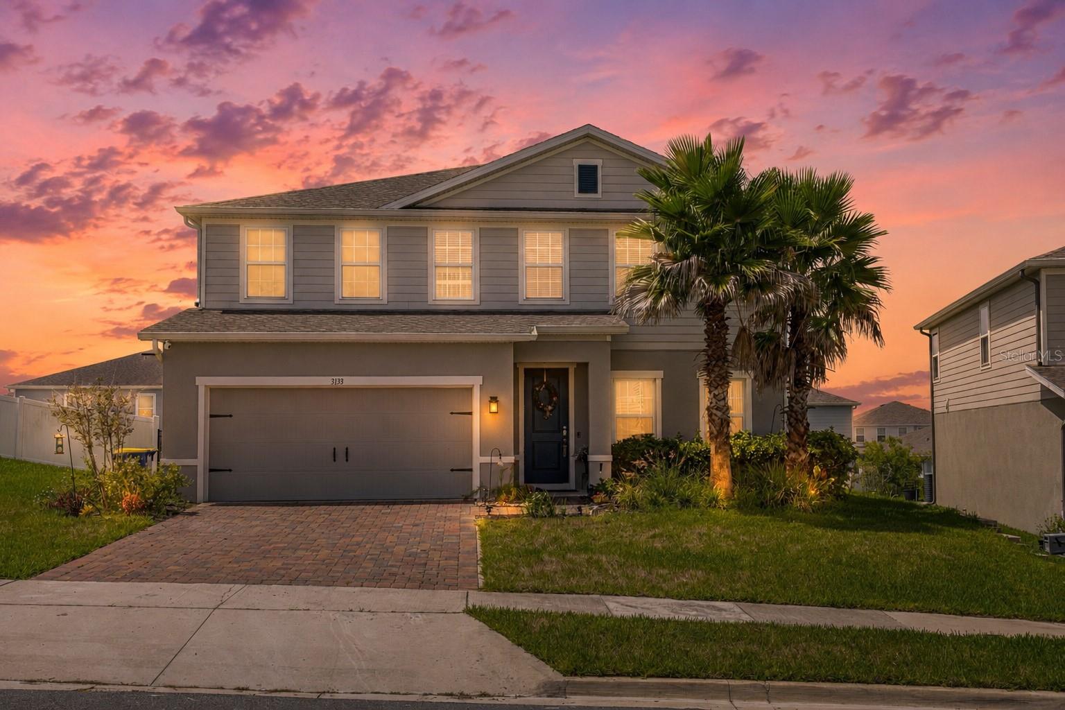 Rare Find – One of the only 5-Bedroom, 3.5-Bath Homes in Overlook at Grassy Lake! This exceptional two-story home offers the space, style, and location that buyers dream of, tucked into one of the quietest sections of the community — just three streets total, offering a peaceful, low-traffic setting rarely found this close to everyday conveniences. Seller offering flooring credit and home warranty!

Downstairs, a flexible den/office space provides the perfect spot for working from home, a playroom, or a formal sitting area. The open-concept main floor is anchored by a chef-inspired kitchen featuring 42" cabinets, a double oven, a huge center island, and generous counter space, flowing seamlessly into the dining and living areas for a truly open floorplan that's perfect for entertaining or everyday living.

Upstairs, a versatile loft space offers endless possibilities as a second living area, playroom, or home office. A guest bathroom with double sinks adds convenience for visitors, while a private bedroom suite with its own en suite bathroom is ideal for guests or anyone who wants their own space. The upstairs laundry room means no more hauling baskets up and down the stairs.

The owner's suite is a true retreat — oversized and comfortable, with not one but two spacious walk-in closets and a spa-inspired en suite bath featuring an oversized linen closet for all your storage needs.

Outside, unwind on the expansive lanai, and enjoy the added privacy and curb appeal of elegant wrought iron fencing on both sides of the home.

Living in Overlook at Grassy Lake means resort-style amenities are just a short distance away, including a community pool, playground, and scenic walking trail — perfect for morning walks, evening bike rides, or weekend outings. Grassy Lake Elementary School is only 1.3 miles away, making school mornings simple.

Location is everything, and this home delivers: Publix is under 2 miles away for effortless day-to-day errands, and the Florida Turnpike is only 1.3 miles away for a stress-free commute to Orlando, Clermont, and beyond.

Five bedrooms, three and a half bathrooms, a prime lot, and a convenient location — homes like this don't last. Schedule your private showing today!