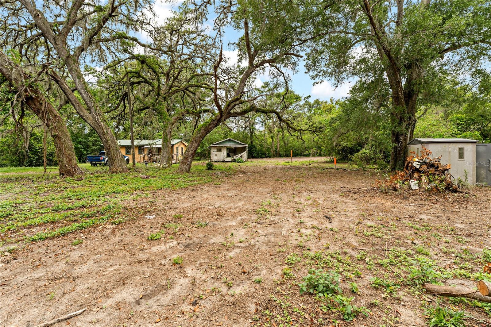 Prime opportunity to build your dream home on this nearly half-acre lot in Zephyrhills. The existing structure is
not habitable and holds no contributory value, making this a perfect site for new construction. Located in a
growing area with no HOA and convenient access to major roadways, shopping, and dining. Bring your builder
and vision! Property is being sold as-is. Buyer to verify zoning, utilities, and future land use.