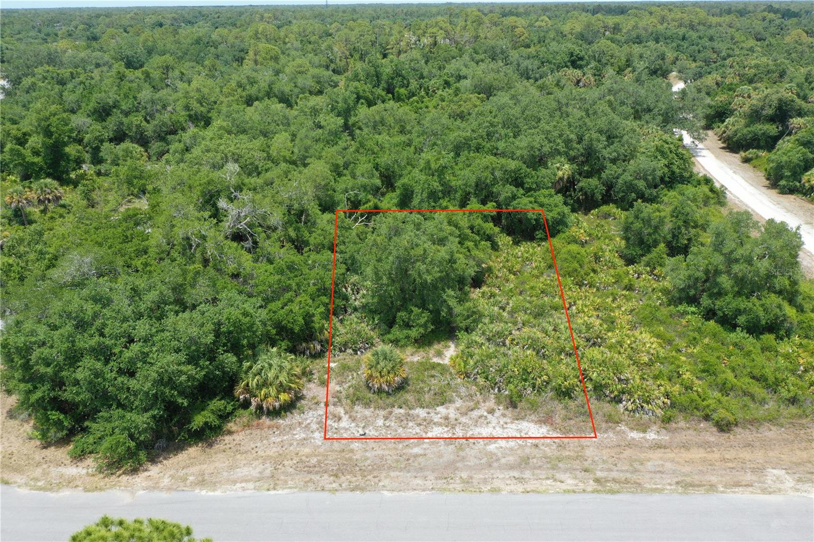 This .23-acre residential homesite on Brixton Terrace offers a fantastic opportunity to build your custom Florida retreat in one of the fastest-growing areas of North Port. The corner lot (Lot 11) is available next to this separately for an oversized "double lot" opportunity! Featuring a standard 80-foot road frontage and a total of 10,000 square feet, this level lot provides ample space for a modern floor plan and a private pool. While well and septic systems are required for construction here, the benefit is the freedom and independence of managing your own utilities in a quiet, established neighborhood. The location is exceptionally convenient for commuters and travelers, sitting just about 10 minutes from I-75, which serves as your primary artery for quick trips north to Sarasota’s cultural district or south to the vibrant waterfronts of Fort Myers and Naples.

Outdoor enthusiasts and wellness seekers will find themselves perfectly positioned near some of the region's most unique natural assets. The historic Warm Mineral Springs Park is only a short drive away, offering a one-of-a-kind chance to soak in the famous 87-degree therapeutic waters that have attracted visitors for decades. For those who prefer to explore on foot or by bike, the nearby Myakkahatchee Creek Environmental Park and Oaks Park provide scenic hiking trails and a glimpse into Florida’s untouched wilderness. This area is a true recreational hub, especially for sports fans who can enjoy being minutes away from the Spring Training homes of the Tampa Bay Rays at Charlotte Sports Park and the Atlanta Braves at the stunning CoolToday Park in Wellen Park.

The lifestyle afforded by this North Port location extends to the finest beaches and waterways Southwest Florida has to provide. You can find yourself on the sandy shores of Englewood Beach in roughly 30 minutes, or exploring the upscale, historic island of Boca Grande in about 40 minutes. For the dedicated angler, this is a world-class destination; the property is a gateway to legendary tarpon fishing in the Boca Grande Pass and incredible flats fishing throughout Charlotte Harbor and the local estuaries. Golfers are equally catered to, with premier courses like Heron Creek and several others just a short drive away. With NO HOA fees or deed restrictions in this specific pocket of North Port, this lot represents a rare chance to own a piece of the Florida lifestyle exactly the way you want it.