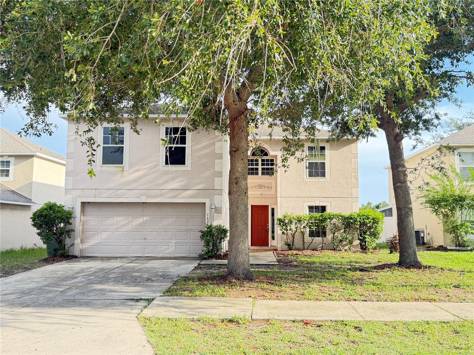 Virtually Staged. This 4-bedroom, 2-bathroom property in Clermont features tile flooring throughout, modern conveniences including a smart thermostat, and flexible living spaces. An upstairs loft retreat and dedicated office provide versatile areas for work and relaxation.

Inside, tile surfaces run through the main living areas for durability and easy maintenance. The kitchen centers on an island, ideal for meal preparation and entertaining. A pantry closet keeps groceries and supplies organized and accessible. Sliding glass patio doors connect the interior to outdoor living space, creating natural flow between indoor and outdoor areas. The primary suite offers a spa-inspired bath as a private retreat from daily activity. Upstairs, an additional loft retreat and dedicated office give flexibility for guests, remote work, or hobbies. A laundry room on the main level keeps household tasks contained and convenient. Climate control throughout the property is managed by programmable technology, allowing easy temperature adjustments.

Outside, the fenced backyard provides a secure outdoor area for recreation and relaxation.

Contact us today to schedule your showing and explore this property in person