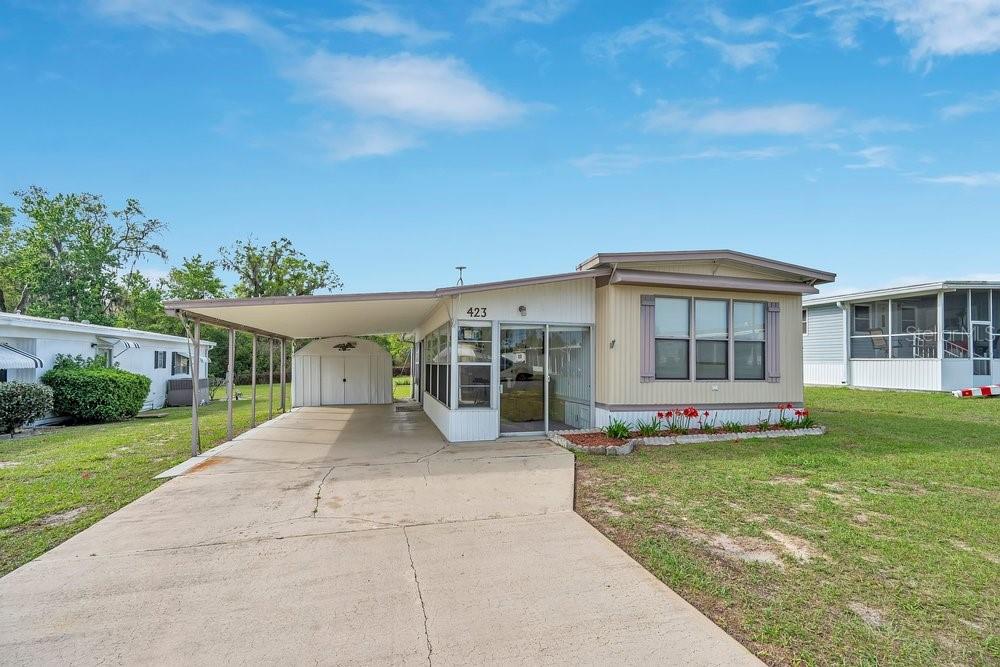 What a fantastic opportunity, look no further! This beautifully maintained 2-bedroom, 2-bath home is perfectly suited for seasonal snowbirds or full-time Florida living. Ideally situated at the end of a quiet cul-de-sac, the property offers both privacy and a welcoming neighborhood atmosphere. Inside, you will find a home that has been lovingly cared for, featuring matching luxury vinyl flooring in the living room, kitchen, and bathrooms, along with newer carpet in the bedrooms and fresh interior paint throughout, creating a clean, cohesive, and inviting feel. Enjoy year-round relaxation in the bright sunroom, filled with natural light from an abundance of windows.
The home also features a durable metal roof and offers added peace of mind, as the property has never experienced flooding or hurricane damage while the seller owned the home. Additional hurricane straps provide extra security and durability. An existing antenna allows access to a variety of local TV channels, including stations from the Tampa area. Located in the desirable 55+ community of Martin Estates, a friendly resident-owned co-op, this property offers exceptional value and long-term stability. As a resident stockholder, you will enjoy approximately 60 years remaining on the 99-year land lease. With a unique ownership structure where residents collectively own the community, monthly costs remain impressively low, with a maintenance fee of just $46/month. Residents can enjoy a range of amenities tailored to those seeking an active and sociable lifestyle. Features include a heated pool, a clubhouse housing a library, card room, billiards area, meeting space, and shuffleboard courts—ideal for soaking up the Florida sun and interacting with fellow community members.
Whether you are looking for a seasonal retreat or a year-round residence, this home is an excellent choice. Schedule your private showing today!