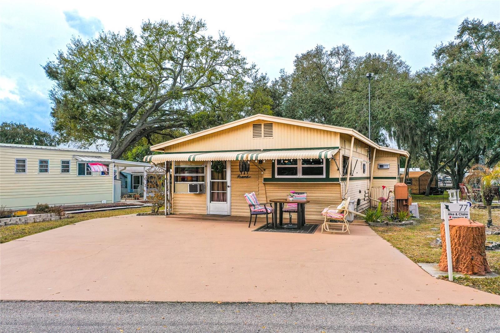 Welcome to this charming 2-bedroom, 2-bath mobile home, completely furnished, in the premier 55+ Saddlebag Lake Resort community! This home has been thoughtfully upgraded throughout, featuring luxury vinyl flooring, a separate dining area, and a breakfast bar/office area with a beautiful butcher block countertop—perfect for work, crafts, or casual dining. Enjoy a roomy living room with a queen-size sofa bed offering comfortable space for family or guests. 

The primary bedroom includes a spacious en-suite bathroom with a newly updated shower, plus a connected laundry/utility workshop/storage room offering plenty of storage. Additional storage is available in two outdoor sheds—one for the included golf cart and the other for tools or extra equipment.

The kitchen has been fully updated with modern finishes, making it both functional and stylish. Step outside and embrace the resort-style lifestyle with lake privileges, community boat ramp, fishing, dog park, and golf cart-friendly streets, plus amenities including a clubhouse, heated pool & spa, fitness center, tennis/pickleball courts, shuffleboard, and horseshoe pits.

This home combines comfort, convenience, modern upgrades, and a vibrant community. Whether you’re looking for a relaxing retreat or an active lifestyle, everything you need is included—just move in and enjoy!