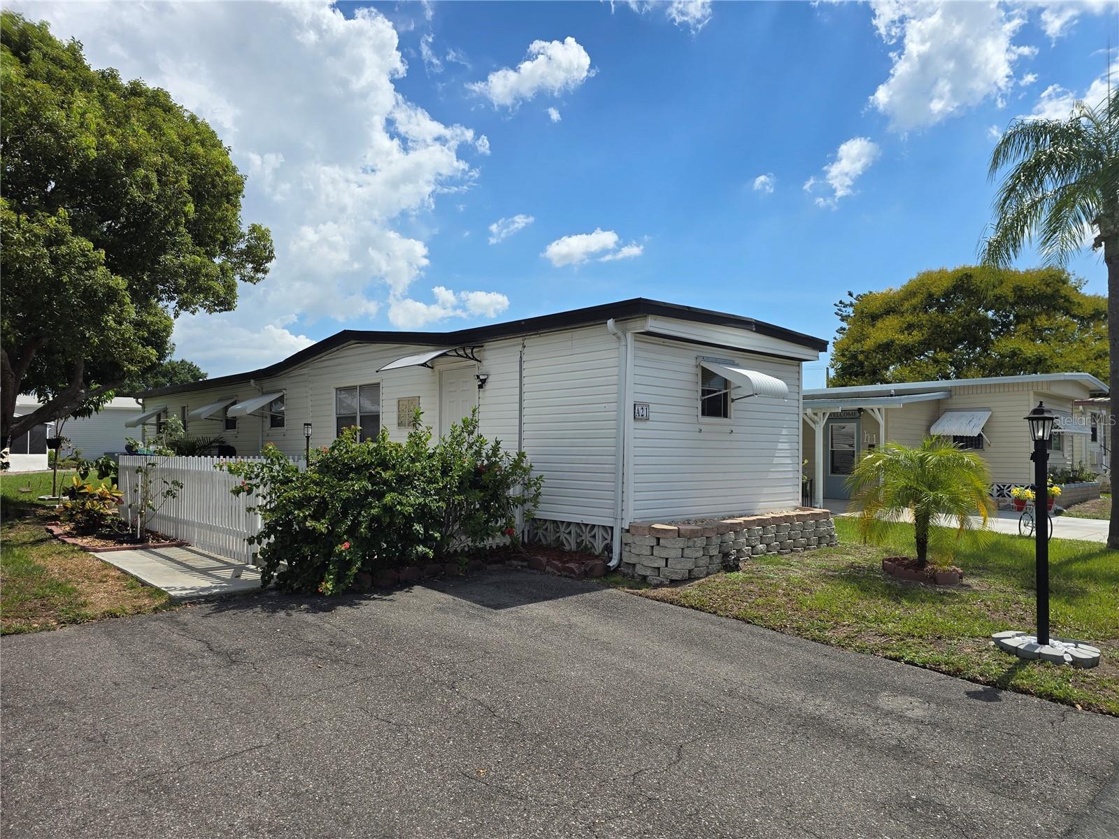 Imagine stepping into a vibrant 55+ community where every day offers something new. This cozy 2-bedroom manufactured home is your gateway to an active lifestyle. Enjoy social gatherings at the clubhouse, leisurely afternoons by the pool, or a game of bocce, billiards, and horseshoes. Conveniently located near shopping and just a short drive from Lakewood Ranch, it’s a perfect blend of comfort and connection. Live where every amenity and social event is at your fingertips!