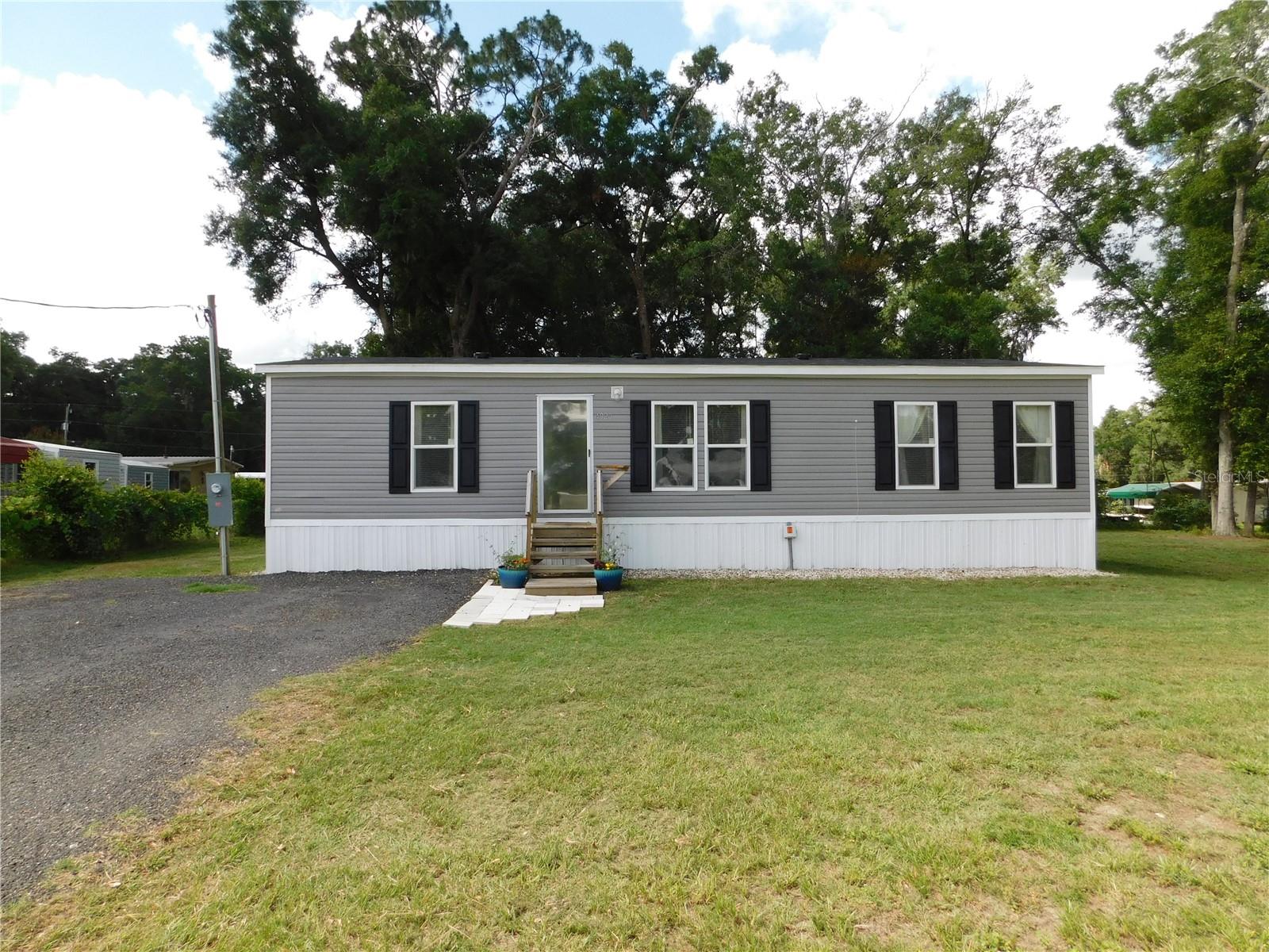 Welcome to this charming 3-bedroom, 2-bath home situated on nearly half an acre in the heart of Summerfield. With plenty of outdoor space, this property offers the perfect balance of privacy and room to enjoy the Florida lifestyle. 

The spacious yard provides endless possibilities for gardening, pets, outdoor entertaining, or simply relaxing in your own backyard. A storage shed is included, offering extra space for tools, equipment, or seasonal items.

Conveniently located, you'll be just 30 minutes from Ocala, On Top of the World, Lady Lake, and The Villages, giving you easy access to shopping, dining, entertainment, and everyday conveniences. For commuters and travelers, I-75 is only 10 minutes away, making trips throughout Central Florida quick and convenient.

Whether you're looking for a primary residence, a seasonal retreat, or an investment opportunity, this property combines space, location, and value in one attractive package.
