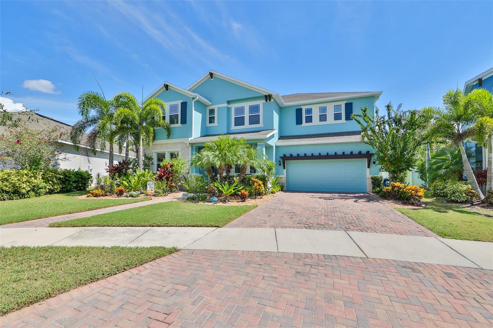 **PRICE REDUCTION**MUST SEE**Located in Admiral Pointe of The Mirabay Community. Outstanding curb appeal and beautiful countless custom upgrades, spanning over 3280 sq. ft. with a Massive Salt Water Chlorinated-Natural Gas Heated Pool/Spa, 4 spacious bedrooms, 3 full baths,1 half bath, office/den and a 3-car tandem garage with Gorilla Epoxied Floors. The extensively upgraded kitchen, walk-in pantry, all quartz countertops with a Farm Sink in the Kitchen, stainless-steel appliances and beautiful Ceramic tile and Luxury Vinyl in the common areas and Master Bedroom... upgraded carpet in secondary Bedrooms, and designer light fixtures and Ceiling Fans. This immaculate two-story home has no rear neighbors and a large Fully Fenced-in Lot. Downstairs you’ll find and office/den area, a Formal Dining room, main living room area with 18+’ ceilings, open Kitchen, laundry room, Breakfast nook and a relaxing fully screened-in Extended Lanai and Pool Area. The Second floor has a gorgeous view of the first floor and surrounding areas, Large Master Bedroom with his and her closets, the master bath has a large walk-in Super Shower, bedroom 2 with a personal bathroom, bedroom 3 and bedroom 4, share a Jack&Jill Bathroom. Garage entry way and front patio are covered with Brick pavers, pool area has Shale stone pavers for added heat control, app automation, 2 Travertine Water Bowls with over-flow, 2 Inset Waterfalls and 2 Water Spout Features. Beautiful Tropically Landscaped Fully-Fenced-in backyard. This better than new home was built in 2017, there is not much inventory and fewer homes like this for sale…So majestically well-lit and spacious with unparalleled upgrades and additions…again it is a must see! Homeowners in Mirabay have many amenities to enjoy such as a community pools, fitness center, café, water access for Bay Fishing and running trails. it’s an all-around great community to live in.