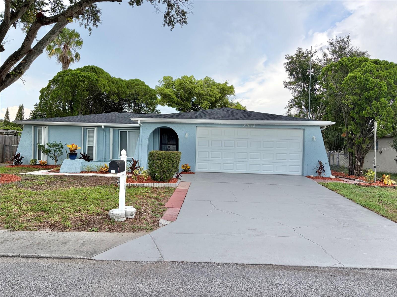 BEAUTIFUL 3/2/2 POOL home . Relax and enjoy the sunset from your backyard pool oasis. This home is not in a flood zone. The large pool will provide endless days of enjoyment. Enjoy the chefs kitchen that includes shaker cabinets, premium Quartz counter tops, stainless steel appliances, breakfast bar, led recessed lights, and tile backsplash. The two bathrooms have been updated with marble vanity tops, new vanities, and porcelain tile. New ceiling fans & light fixtures thru-out. Natural wood luxury vinyl plank flooring throughout the entire living space and porcelain tile in the bathrooms. New Window Treatments, New 5 1/2" Baseboards, freshly painted interior and exterior. Brand new roof. Newer ac.  New landscaping in front with a beautiful shade tree. Centrally located. Minutes to gulf beaches, the Anclote fishing pier and historic Tarpon Springs. Tampa airport and the Suncoast Parkway are a short drive from this home, also. DON’T MISS OUT ON THIS POOL HOME. IT WILL NOT LAST LONG.