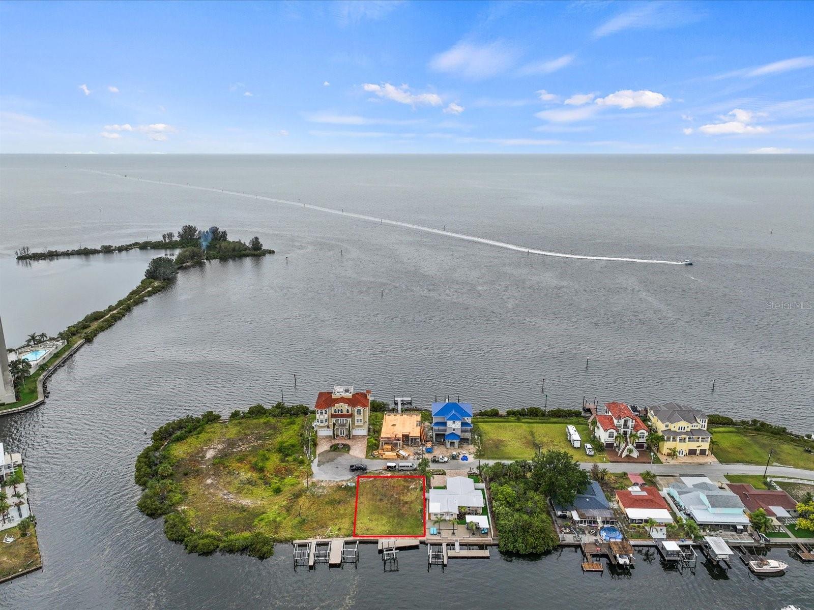 Gulf of Mexico Views and Direct Gulf Boating Access Residential Building Lot

Welcome to a rare opportunity to own a piece of paradise in Hudson with Gulf of Mexico views, nestled along Florida’s stunning Gulf Coast. This exceptional lot boasts 60 feet of prime waterfront on a saltwater canal with a concrete seawall and 10K boat lift with stationary dock, providing direct access to the Gulf of Mexico without any fixed bridges. Imagine waking up to dolphins and manatees frolicking in your backyard, while you cast your line for redfish, snook, and snapper right from your own property.

Dock Details:
• Installation of nine (9) 10” marine grade piles, drilled.
• All new piles to be wrapped with high density .03” black polyethylene wrap.
• Construction of new ~324ft2 fixed dock (per drawing) to be flush with top of seawall. All framing to be pressure treated
marine grade lumber fastened with galvanized hardware. Decking to be WearDeck composite secured with stainless
decking screws.
• Installation of DavitMaster 16,000 lb capacity aluminum 2-motor direct drive cradle lift with pod-style bunks and
remote control with auto-stop.
• Full service permitting - Pasco County.

This property offers unparalleled boating convenience. The saltwater canals ebb and flow with the tides, enhancing your waterfront experience daily. Importantly, this section operates without an HOA, offering freedom from deed restrictions.

This lot presents the perfect canvas for your Gulf Coast dream home—a tranquil retreat where coastal living meets unmatched convenience. Whether you’re seeking a permanent residence or a vacation escape, Hudson promises a lifestyle defined by breathtaking sunsets, endless fishing adventures, and the soothing rhythms of Gulf Coast living.

It is the buyer’s responsibility to verify all information and perform any due diligence/inspections that they deem necessary. Street address needs to be verified with county. This lot is the perfect place to build your Gulf Coast Fishing Home!

Don’t miss out on this opportunity to build your own slice of paradise in Hudson. Schedule a viewing and begin your journey towards owning a waterfront oasis on Florida’s enchanting Gulf Coast