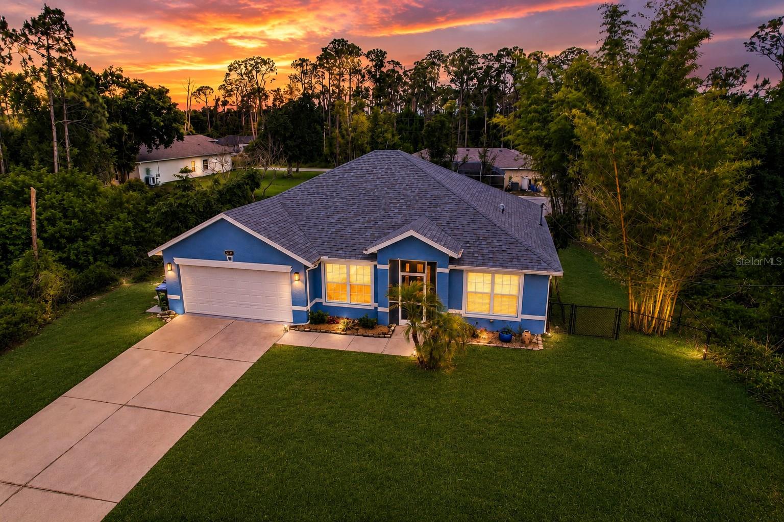 Virtually Staged. PRICE REDUCTION!

North Port property located in Flood Zone X.
This home includes numerous recent updates, including a roof installed in 2023, luxury vinyl plank flooring installed in 2026, water heater replaced in 2023, HVAC system installed in 2018, and interior and exterior paint completed approximately one year ago. A whole-house reverse osmosis water filtration system provides treated water throughout the home.

The primary bedroom includes an updated double shower. Both bathrooms feature granite countertops. Kitchen appliances have been updated, and the washer and dryer are approximately one year old.

The property includes well and septic systems and offers outdoor space for gardening, recreation, pets, or additional uses permitted by local regulations. A large chicken coop is already in place.

The yard contains a variety of established fruit-producing and ornamental plants, including banana, Meyer lemon, orange, mango, mulberry, blackberry, cinnamon, bamboo, and an Ice Cream Bean tree.

Additional features include no HOA fees or deed restrictions, a vacant status for easier scheduling, and a location convenient to shopping, dining, parks, medical facilities, and major roadways.

Schedule your showing today.