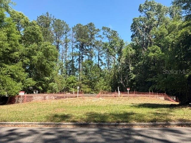Open Builder lots, zoned for 4 units, existing concrete slab in place. Property was surveyed in 2020. Backs up to golf course.