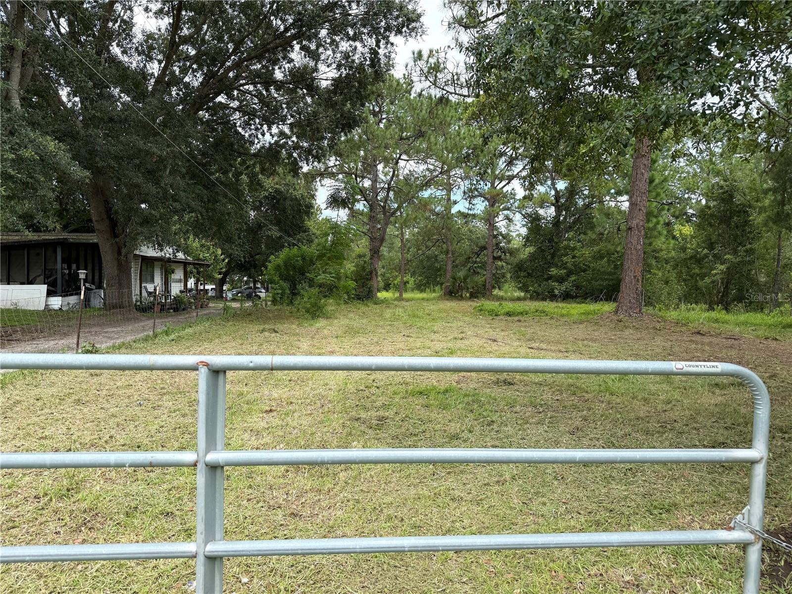 Over 3 acres lot land in east Orlando with NO HOA! Has a significant part high and dry to build your dream home. Please see wetland report attached. Country living at its best. Very quiet and spacious land to build your dream home. Located ideally close to Orlando, Cocoa beach and the space coast. Close to UCF, Valencia College, Waterford marketplace. Short drive to Disney and all attractions. This is a rare opportunity to own your 3-acre land in Orlando.