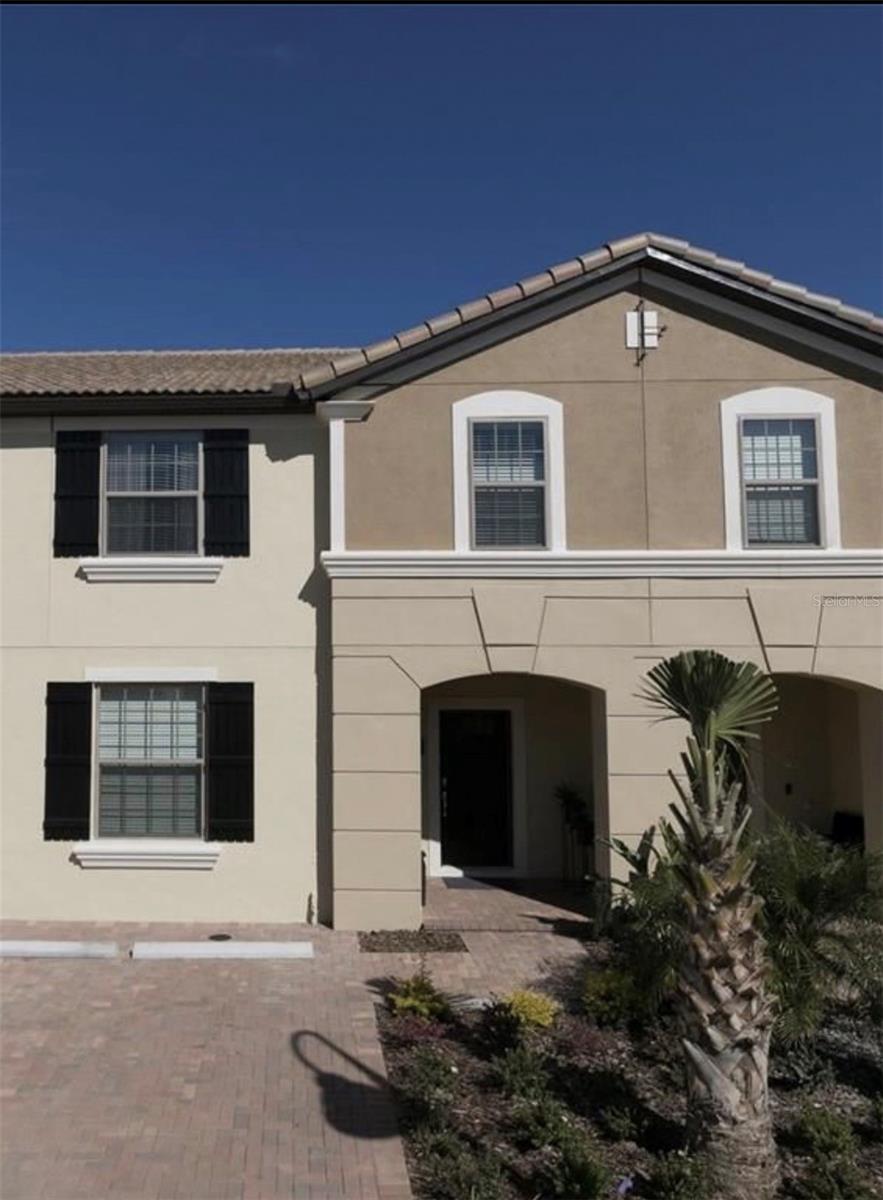 Welcome to this beautifully furnished and professionally decorated 5-bedroom, 4.5-bath townhome located in the highly desirable gated community of Windsor at Westside. Offered fully furnished and move-in ready, this home has everything you need—just bring your suitcase and start enjoying the Florida lifestyle.

The spacious open-concept floor plan features generous living and dining areas, a fully equipped kitchen, and a private screened-in pool, perfect for relaxing and entertaining. The home is tastefully decorated and fully equipped for comfortable long-term living.

A rare feature of this property is that there is NO CARPET throughout the home. All flooring consists of ceramic tile and laminate flooring, providing a cleaner, more modern look and easy maintenance.

Residents enjoy access to outstanding resort-style amenities, including a clubhouse, fitness center, resort-style pool, lazy river, waterslide, playground, sports courts, and more. Conveniently located near shopping, restaurants, major highways, theme parks, and everyday conveniences.

Families will appreciate the area’s highly rated schools, making this an excellent option for those seeking both comfort and quality education opportunities for their children.

Available for annual lease. Fully furnished and move-in ready. Experience the perfect combination of comfort, convenience, and resort-style living in one of Central Florida’s most sought-after communities.