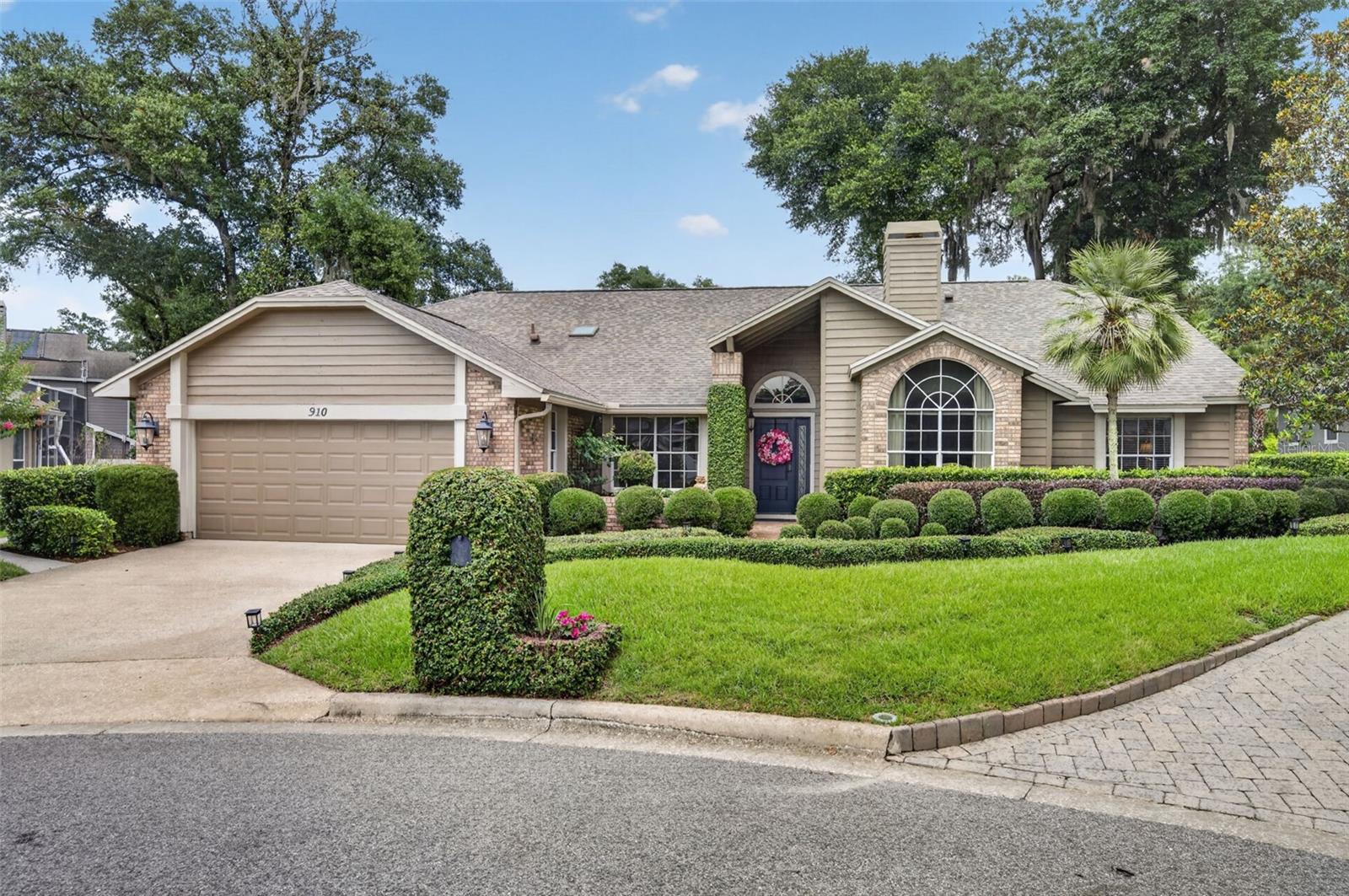 Welcome to an exceptional residence in the highly sought-after gated community of Sweetwater Springs, where luxury living meets an unparalleled outdoor lifestyle. Residents enjoy exclusive access to the pristine, spring-fed waters of Lake Brantley, complete with a private beach, park, basketball court, pavilion, and a residents-only concrete boat launch. Outdoor enthusiasts will also appreciate the community's riverfront park on the Wekiva River, featuring kayak and canoe storage just steps from the water and private launch access. Additional neighborhood amenities include a clubhouse, recently renovated tennis and pickleball courts, parks and playgrounds. Exquisitely maintained and thoughtfully updated, this stunning 4-bedroom, 2.5-bath residence showcases timeless elegance, exceptional craftsmanship, and bespoke finishes throughout. The desirable split-bedroom floor plan offers privacy and functionality, while soaring ceilings and abundant natural light create an inviting atmosphere. At the heart of the home, the spacious family room features dramatic volume ceilings and a striking double-sided wood-burning fireplace that creates a warm ambiance in both the family and dining rooms. The beautifully remodeled eat-in kitchen is a chef's dream, boasting granite countertops, quality cabinetry, and stylish finishes. The expanded primary suite serves as a true retreat, enhanced by a sun-filled sitting room complete with an electric fireplace and French doors opening to the screened lanai and heated pool. The luxurious primary bath has been fully renovated with elegant marble tile, a frameless glass shower enclosure, and dual shower heads for a spa-like experience. Quality details abound throughout the home, including plantation shutters, crown molding, custom built-ins, and beautifully remodeled bathrooms. Recent improvements provide peace of mind and modern efficiency, including a new HVAC system installed in March 2025, a new heat-pump pool heater, and an impressive $40,000 solar energy system designed to significantly reduce utility costs. Step outside to your private screened pool oasis, perfect for entertaining or relaxing year-round. The cul-de-sac location and large .29-acre lot make this a prime location within the community. The new irrigation system keeps the finely manicured lawn and hedges looking "yard of the month" perfect! Combining refined elegance, thoughtful upgrades, and access to some of Central Florida's most coveted recreational amenities, this extraordinary Sweetwater Springs home offers a lifestyle that is truly second to none.