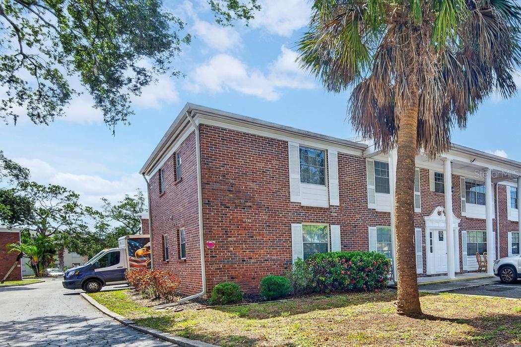 Beautifully well maintained 2-bedrooms/1-bathroom condo in non-age restricted, condo in small, pet friendly well managed community of only 44 units nestled among mature trees on a dead-end street in West Bradenton for under $100K! Large, enclosed lanai! On site laundry facilities available! Assigned parking space included! Flood insurance, water, sewer and trash are all included in monthly condo fee! Community pool and clubhouse on site. Close to shopping, schools, medical facilities, the bus line and other amenities. Just a short ride to the beach! Roof was replaced a few months ago! Hurry, this won't last long on the market!