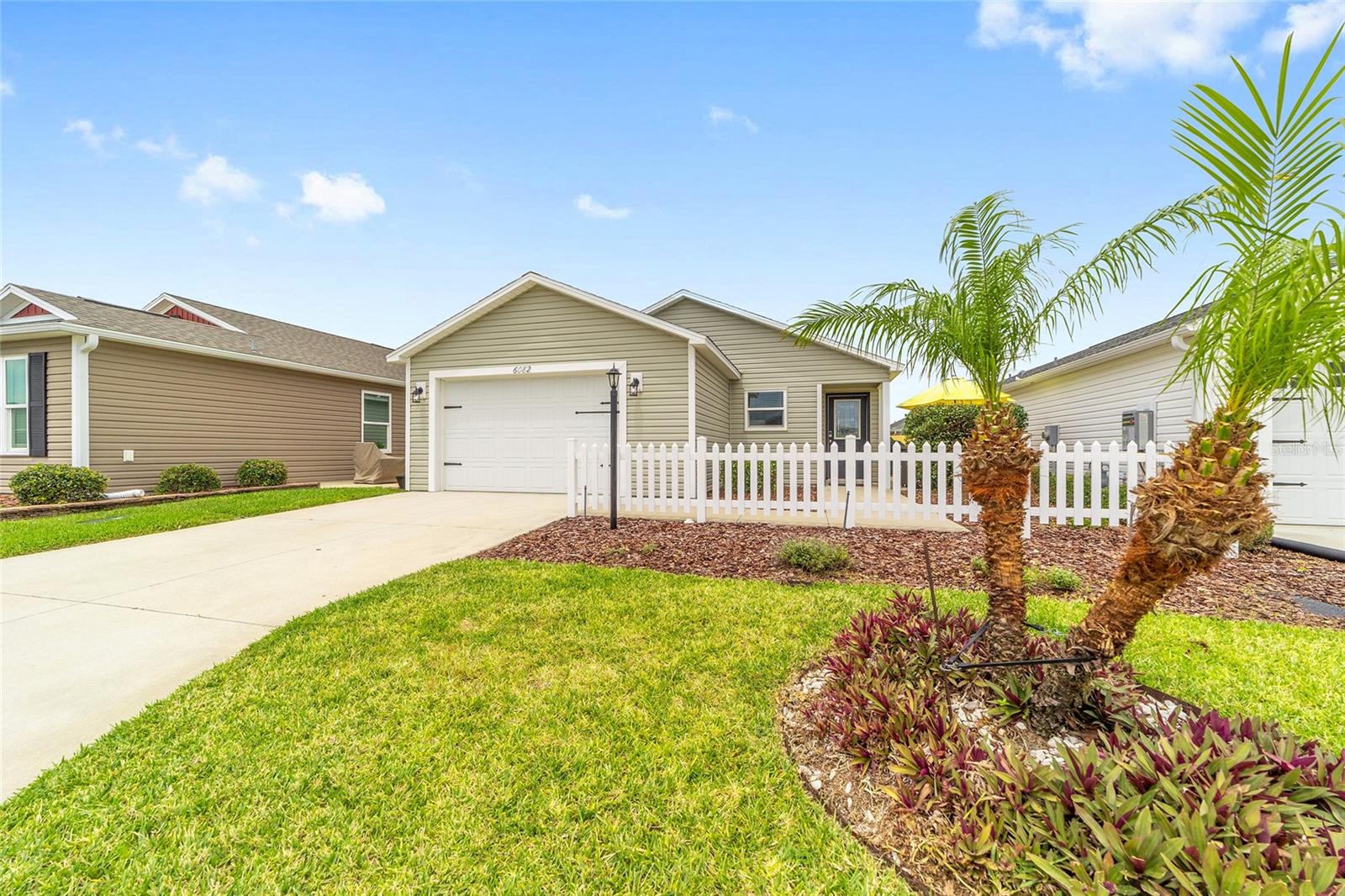 This charming 1-bedroom, 1-bath Cottage Villa in the desirable Village of Monarch Grove, in The Villages, FL.  A premier Active Adult 55+ retirement community offers the perfect opportunity to experience the lifestyle so many dream about—without the upkeep of a larger home.  Who thought you could live a life fully retired in sunny Florida? At this price, this will not last. There are not many small homes like this available.  Located just 3 miles from Eastport, an 8 min golf cart ride,  this low-maintenance villa allows you to spend less time caring for a home and more time enjoying life.  Whether your perfect day includes exploring miles of scenic golf-cart paths, golfing, shuffleboard, billiards, pool time, meeting friends for lunch, enjoying live entertainment, participating in clubs and activities, or discovering new hobbies, you'll find endless opportunities right outside your door.  This property is ideal for those looking to fully embrace retirement in Florida, establish a seasonal getaway, or explore an investment opportunity in one of the nation's most sought-after active adult communities.  It's also a wonderful way to experience firsthand what makes The Villages so unique before committing to a larger home.  Imagine waking up to sunshine, hopping in your golf cart, and spending the day exploring neighborhoods, recreation centers, pools, golf courses, dining destinations, and town squares filled with music and activity.  Here, retirement isn't about slowing down—it's about finally having the time and freedom to enjoy the things you love most.  Affordable, convenient, and perfectly located, this Cottage Villa offers an exceptional opportunity to discover whether the unmatched lifestyle of The Villages is the next chapter you've been looking for.  Schedule your showing today and come see what all the excitement is about.  The grocery store is less than a 10-minute golf cart ride away. This is the ideal location with nearby shopping, dining and endless golf courses.