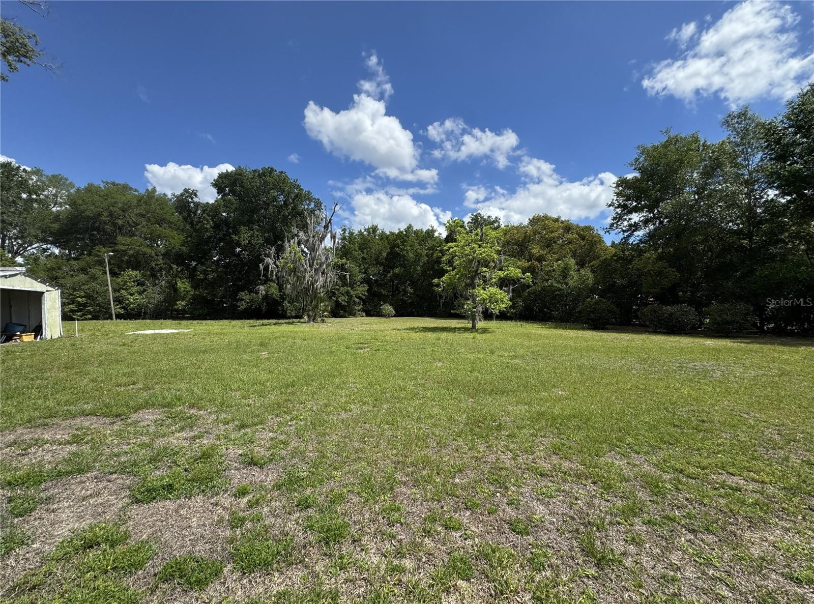 FOUR LOTS IN UMATILLA SOLD TOGETHER. A quiet, historic "Old Florida" town center.  The area maintains a nostalgic feel, with many historic structures still in use. Plenty of local eateries and shops to enjoy. Umatilla offers a "sparse suburban" feel, providing a contrast to nearby, more busy cities.  While boasting local charm, the town is relatively close to larger amenities in nearby Eustis and Mount Dora. Umatilla is also surrounded by numerous small to medium-sized lakes, with many within 3 miles. Top lakes immediately in or bordering Umatilla include East Lake, Lake Pearl, Lake Umatilla, Lake Enola, and Island Lake. Don't miss this opportunity!