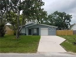 Great newly remodeled 3+ bedrooms/2 bath home near schools, shopping and river fishing. Just 10 min. to the beach.Huge master bedroom and walk-in closet.  Updated plumbing,roof, electrical, A/C, interiors, just over a year ago! Kitchen has stainless steel appliances and stone counters. This open floor plan with over 1,700+ in living area has a flex room for office or den or man cave. Screen room looks out to the stars and a fenced yard. Let Rover run free. Room for a pool! Has an oversized 1 car garage and is turn key. Come see. ;Water: City