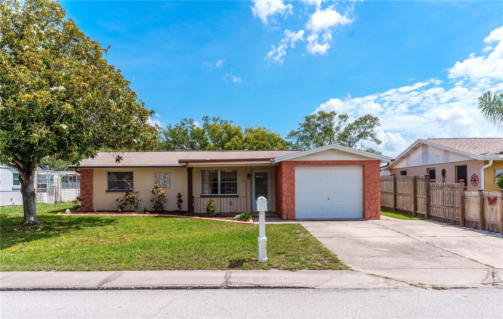 Check out this One Owner house since 1973.  A 2 Bedroom, 2 full size baths (shower in one) 1 Car Garage in a Non-Flood Zone. Living Room, Dining Room Combo, Florida/or Family Room and Screened Porch.  Backyard partially fenced.  Great for 1st time home buyer or investor
looking for their next remodel.  Inside does need updating.  Air Conditioning 2023 - New Hot Water Heater 2024.  A new roof is more than likely needed.  No HOA and X Flood Zone.  Check it out.