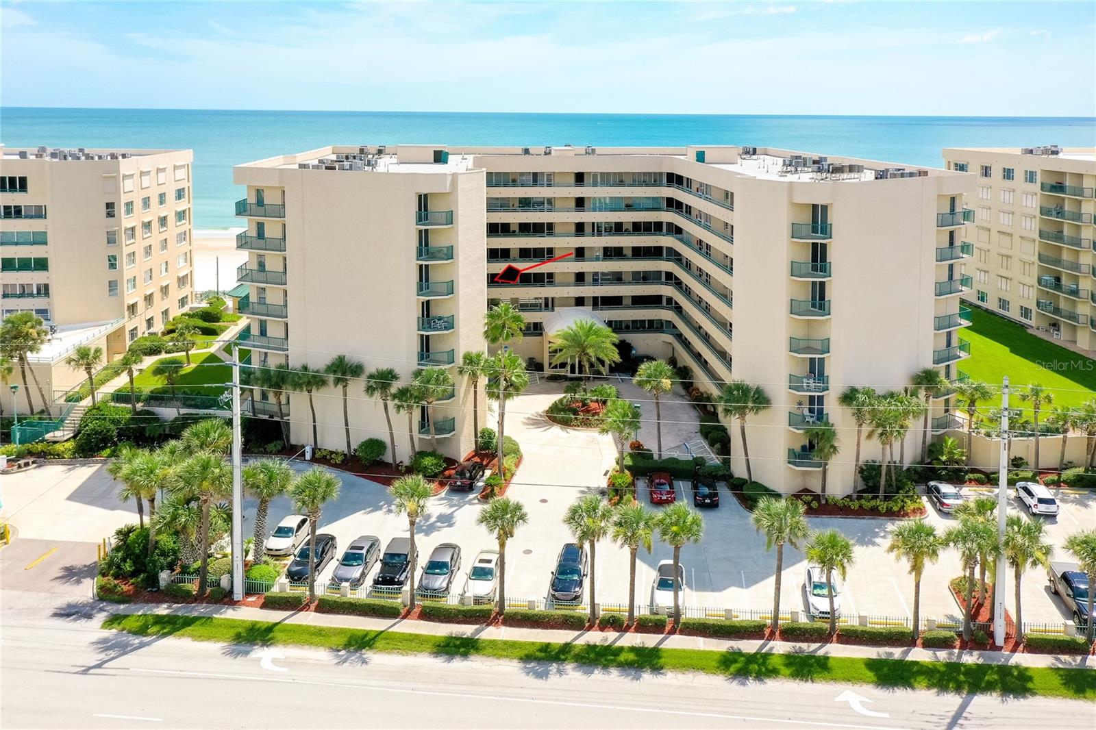 This oceanfront condo boasts million-dollar views from its 3rd-floor balcony, offering a direct view of the Atlantic. Featuring 2 bedrooms and 2 baths, it allows easy access to the private pool and no-drive beach. The oversized balcony, accessible through sliding glass doors in both the living room and master bedroom, invites relaxation and seamless outdoor living.
Inside, enjoy high-end updates like quartzite countertops, custom cabinetry with under-cabinet lighting, and spacious walk-in closets. The condo has a breakfast nook and a Roman tub in the master bath. The tile and wood laminate floors throughout make for low-maintenance living, and there's a glass-enclosed lanai perfect for watching sunsets over the Intracoastal.
Additional features include motorized hurricane shutters, an in-unit laundry room, and access to resort-style amenities like 3 outdoor pools, Jacuzzis, a large fitness center, and tennis/pickleball courts. Located in the serene Towers at Ponce Inlet, you'll enjoy living in a quaint town with a traffic-free beach, the historic lighthouse, the Marine Science Center, parks, and dining options. Boat dockage and storage are available, making it a boater's paradise.
