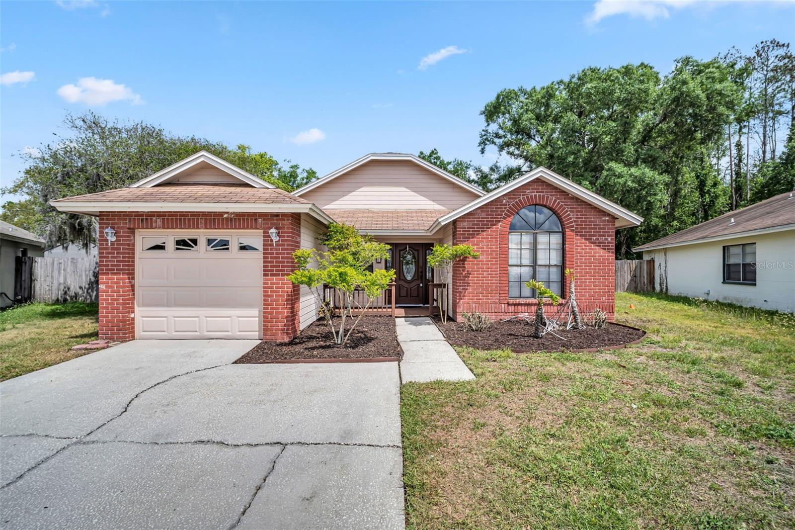 Welcome to this well-maintained 3 bedroom, 2 bathroom home in Tampa offering comfort, an easy-flow layout, and Florida outdoor living. The home features a bright and inviting layout with spacious living areas designed for everyday living and entertaining, along with sliding glass doors from the living room providing direct access to the pool area.
The primary bedroom offers ample closet space and includes a private en-suite bathroom featuring dual vanities and a walk-in shower. Both bathrooms feature walk-in showers for added convenience and modern appeal. Additional bedrooms provide flexibility for guests, a home office, or other needs.
Step outside to enjoy your private fenced backyard complete with an in-ground pool within a screened lanai enclosure—perfect for relaxing or entertaining year-round.
Additional features include a 1-car garage and a convenient location close to shopping, dining, parks, and major roadways.