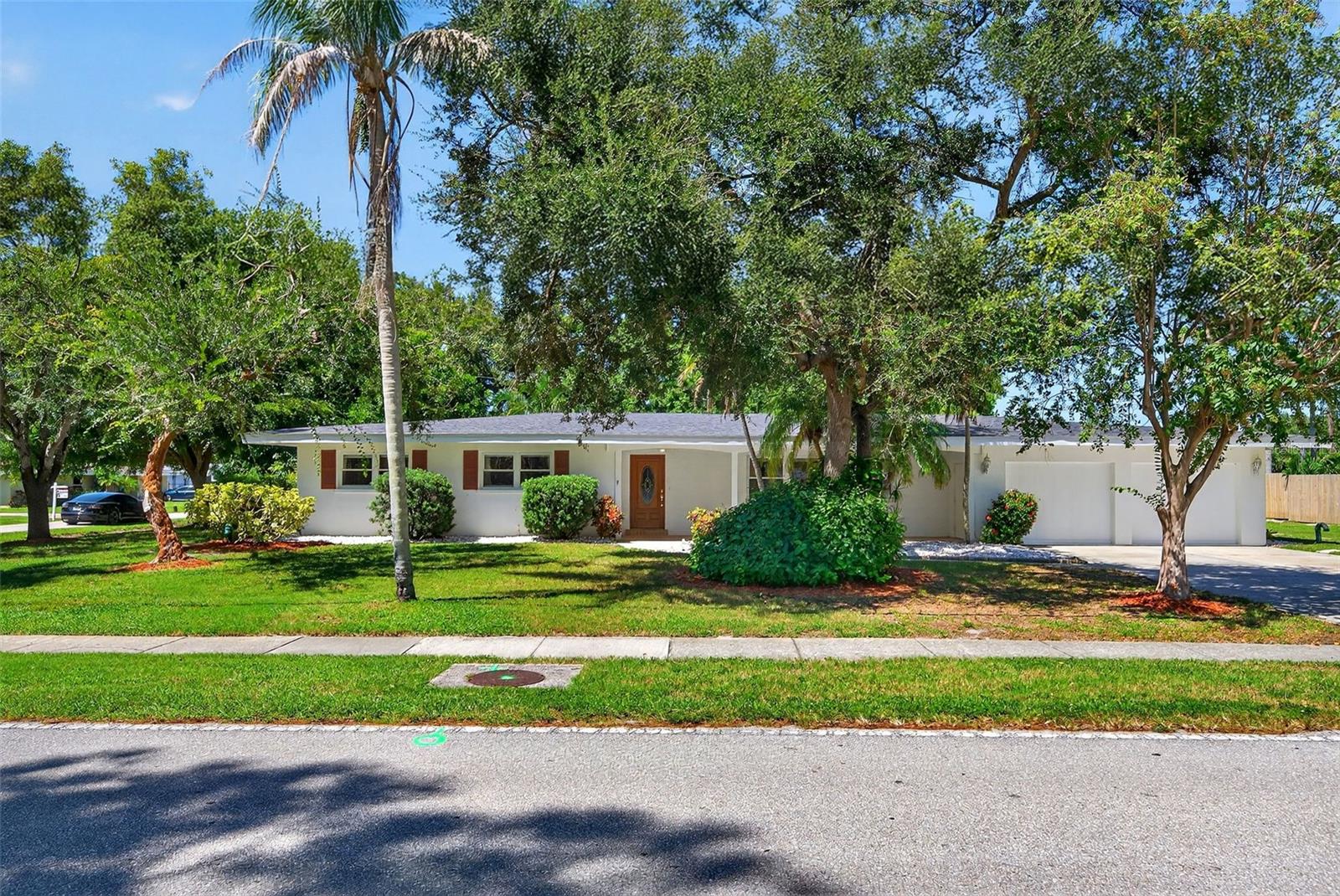 Spacious and versatile 2,700± sq. ft. block home situated on a large double corner lot in one of Sarasota's most desirable family-friendly neighborhoods. A standout feature of this property is its walking-distance access to highly sought-after A-rated schools, making it an exceptional choice for families seeking top-tier education and convenience.

This well-maintained home features a new roof (2025), 3 bedrooms, 2 bathrooms, a dedicated office, and a private mother-in-law suite with separate entrance—ideal for extended family, guests, a home business, or potential rental income. The property remained high and dry and offers the freedom of no deed restrictions, providing ample room for boats, RVs, and recreational vehicles.

The oversized double corner lot offers endless possibilities, including room for a pool, outdoor entertaining, or future expansion. An added bonus is the property's potential development opportunity. Subject to Sarasota County approval and all applicable zoning and land-use requirements, the parcel may be divided into two buildable lots. Buyers should conduct their own due diligence regarding subdivision and future development potential.

Located just 3.5 miles from world-famous Siesta Key Beach and approximately 10 minutes from downtown Sarasota, you'll enjoy easy access to award-winning restaurants, shopping, arts, and entertainment while still being tucked away in a quiet neighborhood setting.

The garage has been converted into a mother-in-law suite (or fourth bedroom) and is included in the heated square footage. It can easily be converted back to an oversized two-car garage if desired.

A rare opportunity offering top-rated schools, flexibility, location, and future potential all in one property.