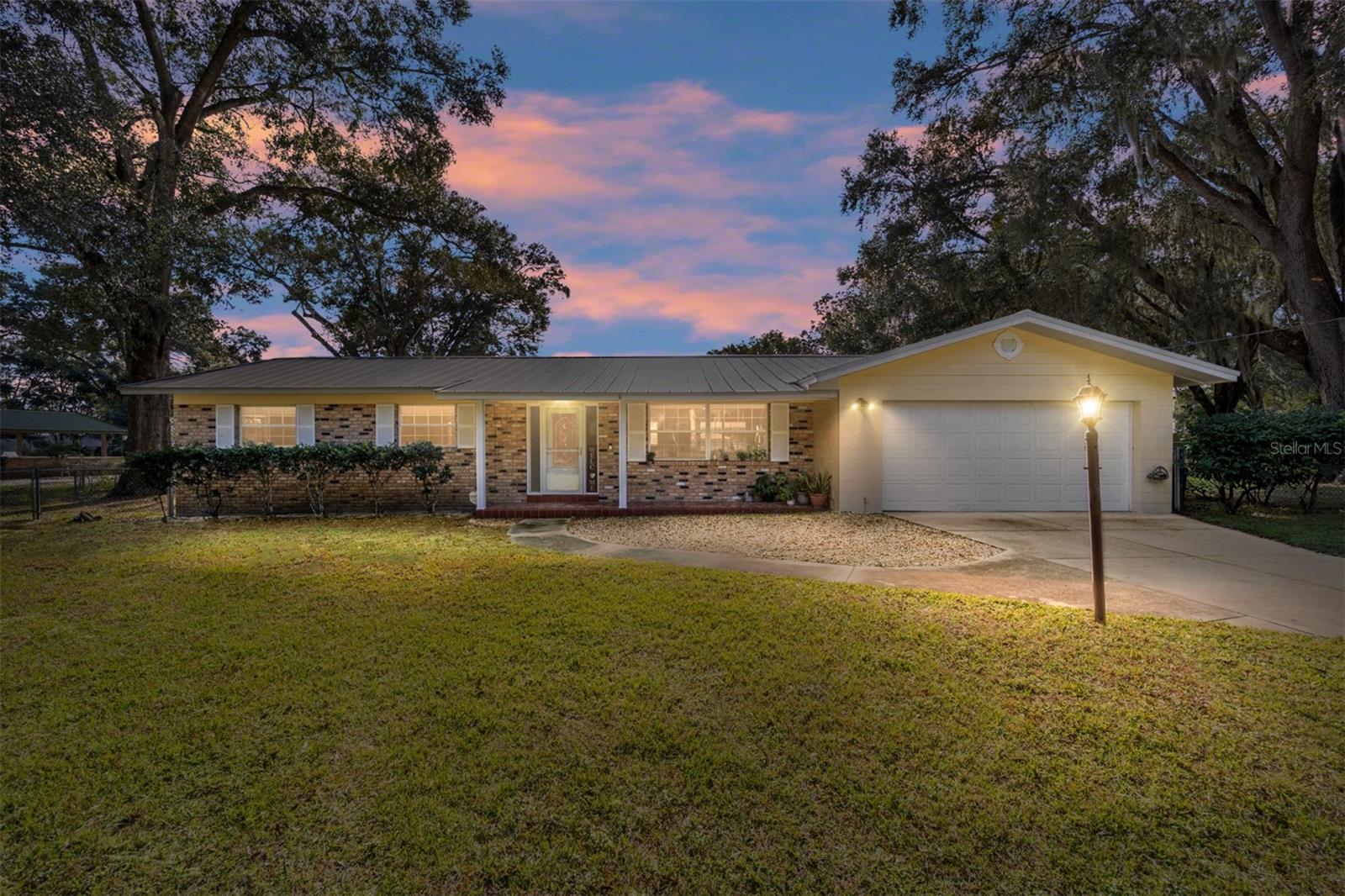 Welcome to your slice of Floridian paradise! Fresh off a comprehensive remodel, this stunning ranch-style residence boasts an impressive 3 bedrooms and 2 bathrooms, artfully spread across an expansive, almost 3/4-acre lot in the serene Wildwood community of Lake Miona Heights.

Step inside to discover a modern, open-concept living area where natural light pours over new flooring and paint, reflecting an aura of contemporary freshness throughout the home. The heart of this home, the kitchen, is a culinary dream featuring brand new stainless steel appliances, elegant countertops, and plenty of cabinet space—all designed with the modern homeowner in mind.

Wake up to peaceful mornings in the primary suite, which presents a tranquil retreat complete with a tastefully updated en-suite bath. The additional bedrooms provide space for family, guests, or even a home office and the large guest bathroom has been modified for handicap access while retaining elegance and beauty.

Outside, the expansive yard offers limitless potential for your very own garden oasis or entertainment hub—imagine evenings spent under the stars or sunny weekend gatherings, all in the privacy of your spacious property. And the best part? Enjoy all of this with no HOA constraints, granting you the freedom to tailor your outdoor living to your very own tastes.

Located in a peaceful and sought-after area of Wildwood, you're just a stone’s throw away from The Villages' renowned shopping, dining, and entertainment. Plus, with easy access to major highways, Orlando, Tampa, and Ocala are all within a convenient commute.

This house is not just a dwelling, but a place to create lasting memories. Don't miss out on making this dream home your reality!

To explore this exceptional property and envision your future here, please contact me for more details or to arrange a viewing. Let's make your homeownership dreams come true!

?Full Remodel 2022

Metal Roof 2022

New Stainless Steel Appliances 2022

New Well pipes and pump and new water softener 2022