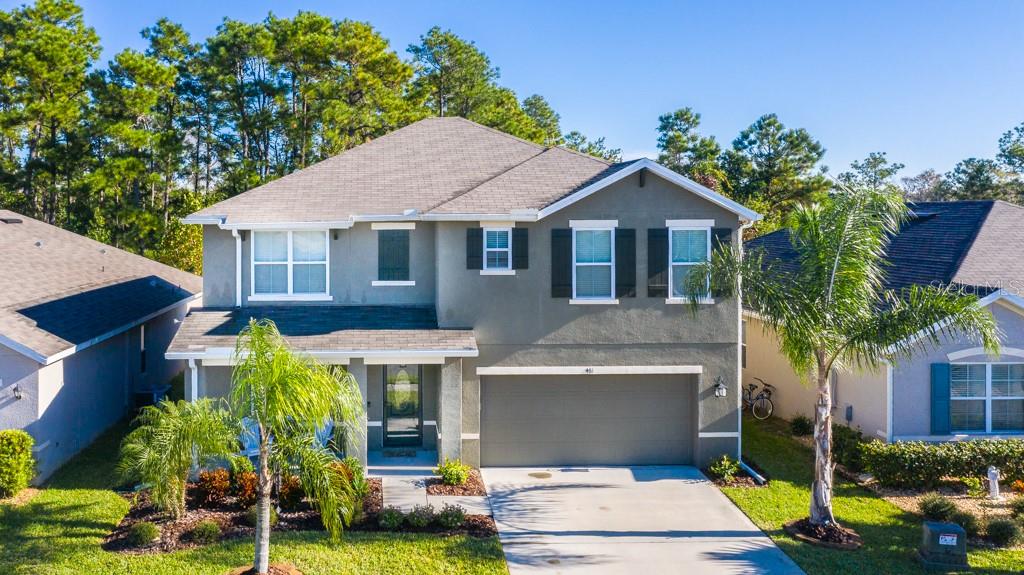 Stunning, upgraded 5 bedroom home with the beauty and privacy of facing a lovely wooded nature preserve - the 3D virtual tour is a must see! - in Sabal Lakes with a community pool.  Built in 2016 and immaculately maintained and stylishly upgraded, this move-in ready home features almost 2,700 square feet of living space with 3 living areas, upgraded wood-look floors throughout, new lighting fixtures inside and out, gutters, new upgraded front door, Brighthouse security system, and upgraded landscaping including additional palm trees. The community pool and New Smyrna Beach Multi-Use Trail are a short walk from the home. Downstairs you'll enjoy a formal living room just inside the entry, then a wonderful large open floor plan with kitchen, dining area and family room. There is also a full bathroom, a bedroom and large under-stairs storage closet downstairs. Upstairs there are 4 more bedrooms, 2 more full bathrooms and large convenient up-stairs laundry room - all centered around an open 10' x 15' sitting area/loft. The large master suite and master bathroom are spectacular. The backyard has white vinyl privacy fencing and faces an HOA-owned wooded nature preserve. Sabal Lakes is one of New Smyrna Beach's newest neighborhoods and centrally located to the best of New Smyrna Beach, Port Orange and Daytona Beach. The community’s close proximity to I-95 & I-4 provide quick & convenient access to all of Central Florida’s and the Space Coasts popular theme parks, attractions, and sports and concert venues. This is a fantastic, large home in a quiet neighborhood with a super convenient location - Don't miss this opportunity! (Room measurements rounded off to nearest foot.) ;Water: City