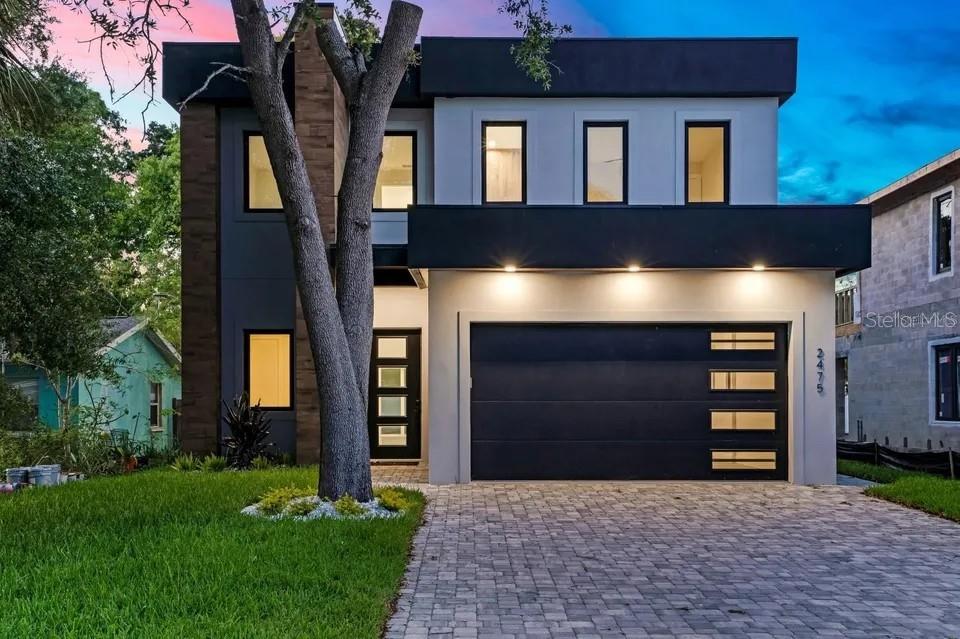 Bold Contemporary Sarasota Luxury Home. 4 Beds/ 4 Baths. Private Pool and Summer Grill.

Modern and spacious *new construction* 3/3 rental plus office and loft, in the heart of Sarasota: complete with luxurious modern interior design plus gourmet kitchen, smart outdoor kitchen and living space, and contemporary pristine pool. Home is open and airy with ample light throughout.

Plus, this home is available as an unfurnished annual rental, or lease-to-own for the perfect buyer.

Experience refined modern living at 2475 Bay Street, a brand-new contemporary residence offering 2,874 square feet of thoughtfully designed space. Clean architectural lines and a striking façade set the tone, while inside, sun-filled interiors reveal soaring ceilings, expansive open-concept living areas, and walls of glass that create a seamless indoor-outdoor connection. The home is designed to feel both elevated and livable, with spaces that flow naturally for entertaining, relaxing, and everyday life.

The home features four bedrooms and four bathrooms, including a main-level primary suite that offers split-plan privacy and direct access to the pool area. The primary bath includes a double vanity, walk-in shower, soaking tub, and spacious his-and-hers closets with built-in accessories. The chef’s kitchen is outfitted with Café appliances accented in gold, premium cabinetry, Calcutta quartz countertops throughout the home, and a dramatic waterfall island seating eight. An upstairs living area overlooks the main level and opens to a second-story balcony, while additional bedrooms feature en-suite baths for comfort and privacy.

Additional highlights include a custom resort-style pool, fully fenced yard, covered lanai with a fully equipped outdoor kitchen, two-car garage, energy-efficient construction, paver driveway accommodating up to four vehicles, and a mudroom with direct access to the pantry.

Ideally located in central Sarasota, this home offers a peaceful residential setting with quick access to downtown and the area’s top attractions. Enjoy nearby Main Street dining, boutique shopping, and cultural venues such as the Sarasota Opera House, Florida Studio Theatre, and McCurdy’s Comedy Theatre. Outdoor and lifestyle destinations include Bayfront Park and Marina, Marie Selby Botanical Gardens, Payne Park, St. Armands Circle, Sarasota Jungle Gardens, The John and Mable Ringling Museum of Art, and Mote Marine Aquarium. World-renowned beaches including Siesta Key, Lido Key, and Longboat Key are just minutes away, along with convenient access to Publix, Sarasota Memorial Hospital, top schools, and Sarasota-Bradenton International Airport.

Schedule your private tour and experience the design, flow, and lifestyle of this unique Sarasota property before it slips away. First, Last, and Security deposit due with Lease.