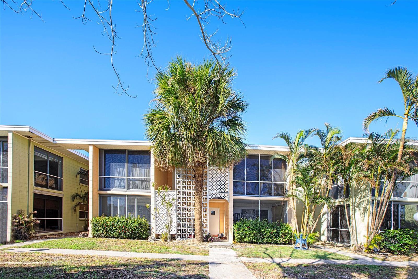 BOATER’S PARADISE – DIRECT GULF ACCESS WITH DEEDED BOAT SLIP & NEW BOAT LIFT! This beautifully remodeled second-floor 1-bedroom, 1-bath condo is a dream for boating enthusiasts. Enjoy direct deep-water access to Palma Sola Bay with your own deeded boat slip, a brand-new Deco Lift (10,000 lb capacity, installed September 2023), and an extended private dock reinforced with five new poles—perfect for launching straight into your next adventure. Best of all, the home was not impacted by the hurricane, providing added peace of mind for waterfront living. Inside, you’ll find modern vinyl flooring, fresh paint, and thoughtful space-saving features that maximize comfort and functionality. The updated kitchen features stainless steel appliances, pull-out storage drawers, and plenty of cabinet space. The stylish bathroom includes a walk-in shower, stone-look tile flooring, and a backlit mirror that adds a sleek, spa-like feel. Relax on the lanai with tinted acrylic sliding doors while enjoying tranquil canal views—the perfect spot to unwind after a day on the water. Low HOA fees cover exterior maintenance, lawn care, pest control, water, sewer, and trash, giving you more time to enjoy the coastal lifestyle. From your dock, it’s only a 15–20 minute boat ride to the Gulf of Mexico, with easy access to waterfront dining, Egmont Key, and Passage Key (about 25 minutes by boat). Jewfish Key’s popular sandbars are just 12 minutes away. The location is just as impressive. You’re a short bike ride from Anna Maria Island and Manatee Beach, and close to Robinson Preserve, Perico Preserve, and De Soto National Memorial—perfect for kayaking, biking, and exploring nature. Historic Cortez Fishing Village is also nearby, offering fresh seafood, local markets, and classic coastal charm. This isn’t just a condo—it’s a lifestyle. Don’t miss this rare opportunity to own a slice of Gulf-access waterfront living. Schedule your private showing today!