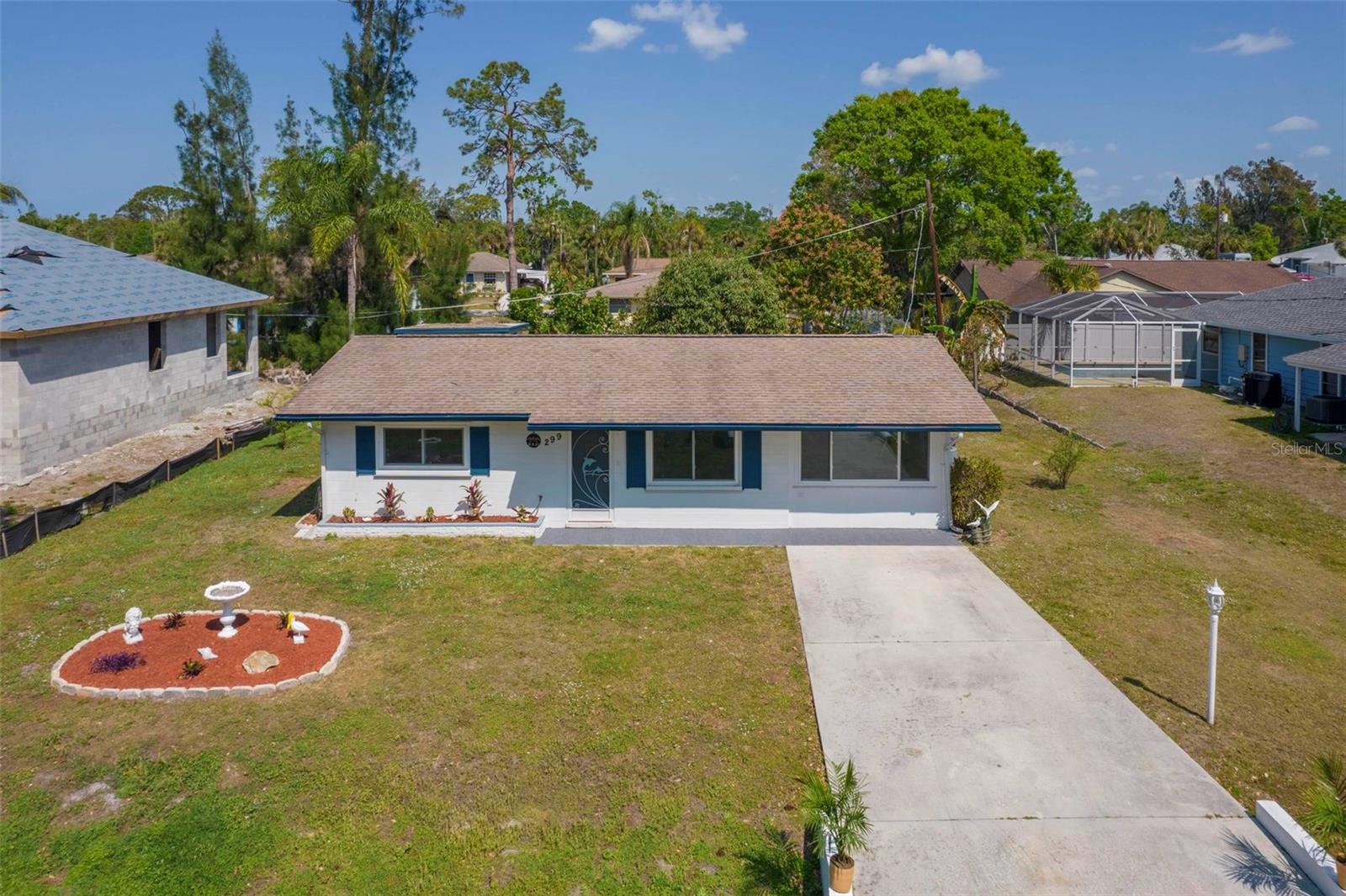 This 4 bedroom, 2 bathroom house located in Venice, FL offers ton of bright and natural light and boasts several recent improvements that make it a highly desirable home. Some of the updates include NEW AUGUST 2023 ROOF with workmanship warranty transferable to the new homeowners, hurricane impact-resistant windows, reverse osmosis water treatment and new carpet and vinyl plank flooring throughout. The bathrooms have new toilets and vanities, and one of the bathrooms has been remodeled with new tile. The kitchen has been updated with new cabinets and GE appliances, including a refrigerator, oven, and over-the-range microwave. The interior of the house features all new doors, including interior and closet doors, and entry knobs. The fresh coat of paint, both inside and out, gives the home a bright and inviting feel that is both welcoming and refreshing. Other features of the home include an interior laundry room, and a large screened patio overlooking the backyard. The backyard boasts a lush tree that provides a cool and shaded spot to relax and unwind, along with a convenient storage shed for your outdoor equipment. The location of this home is unbeatable, with close proximity to US 41 & to the stunning Florida beaches that are perfect for a day of sun and sand or fishing. Overall, this house is a fantastic opportunity for anyone looking for a beautifu home in a desirable location.
