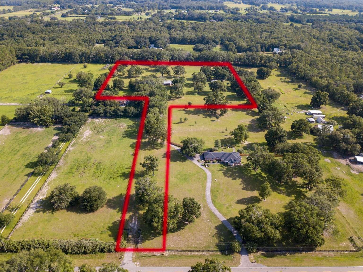 Stunning 9.48-Acre Country Estate Opportunity in Alachua County, Florida

Experience the timeless beauty of Old Florida as you enter through a picturesque tree-lined driveway beneath majestic, moss-draped oak trees. This beautifully maintained 9.48-acre property offers a rare combination of privacy, charm, and functionality.

The manicured pasture is ready for horses, livestock, or your dream country estate. With two pole barns already in place, along with a private well and electricity, much of the groundwork has been completed for your future home, farm, or recreational retreat.

Whether you’re looking to build a custom home, establish a hobby farm, or simply enjoy the peace and beauty of rural living, this exceptional property provides endless possibilities. Enjoy the serenity of the countryside while remaining just a short drive from Gainesville, Alachua, and the conveniences of shopping, dining, schools, and medical facilities.

Properties with this level of natural beauty, mature oak trees, and existing improvements are increasingly difficult to find. Don’t miss your opportunity to own a truly special piece of North Central Florida.