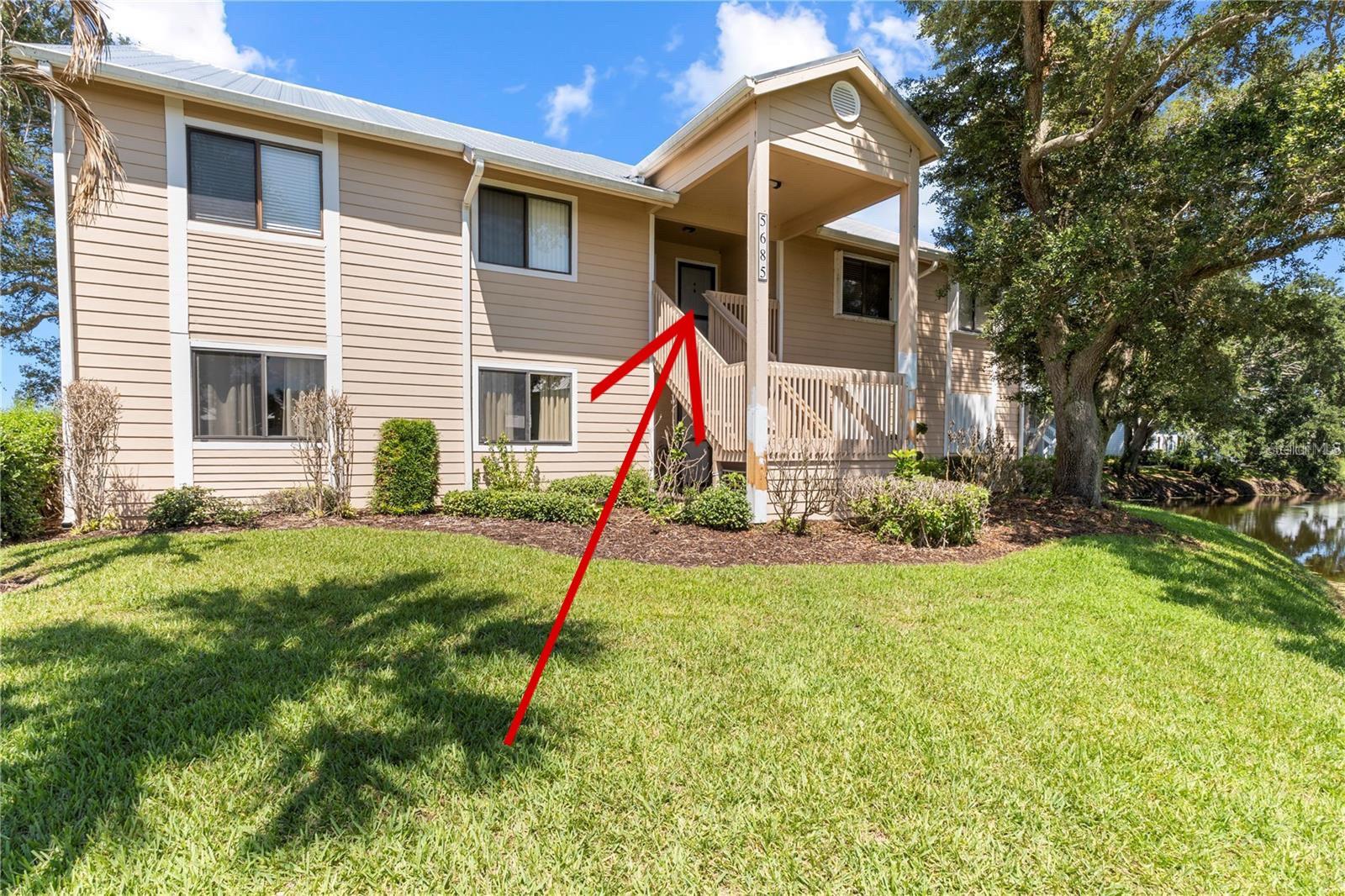 Nestled in the picturesque community of Pelican Pointe, this charming second-floor condo offers a serene and comfortable lifestyle in the heart of Sebastian, Florida.  With 2 bedrooms and 2 bathrooms, this condo is ideally situated just steps away from the river, docks, and boat ramp, providing both leisure and convenience.

The condo features a screened and enclosed deck accessible from both the living room and the primary bedroom, offering stunning views of the 4th green of the golf course.  This deck is not only a perfect spot for relaxation but also includes a functional storage closet.

Inside, you'll find vaulted ceilings that add character and enhance the spacious feel of the condo.  The eat-in kitchen overlooks the living room, making it an ideal setup for entertaining guests.  Notable Features Include: FRESHLY PAINTED INTERIOR WALLS and BRAND NEW CARPET IN THE LIVING AREAS, freshly painted exterior, 2025 Stackable Washer and Dryer, 2024 Dishwasher and Kitchen Faucet, 2023 Metal Roof, 2023 AC, 2022 Window Blinds, 2021 Water Heater and Garbage Disposal.  Also included are Hurricane Shutters for additional security and peace of mind. 

Pelican Pointe offers a variety of amenities that cater to different lifestyles.  If you're a golf enthusiast, you'll love the proximity to the course.  The community also features a clubhouse for socializing, a refreshing swimming pool, and plenty of opportunities for fishing or bird watching around the pond.  This beautifully maintained community is adorned with mature trees, lush landscaping, and a tranquil pond, creating a peaceful and inviting atmosphere.

There is so much to love about this community and this condo!  We invite you to schedule a showing today and discover the charm and comfort of this delightful home.