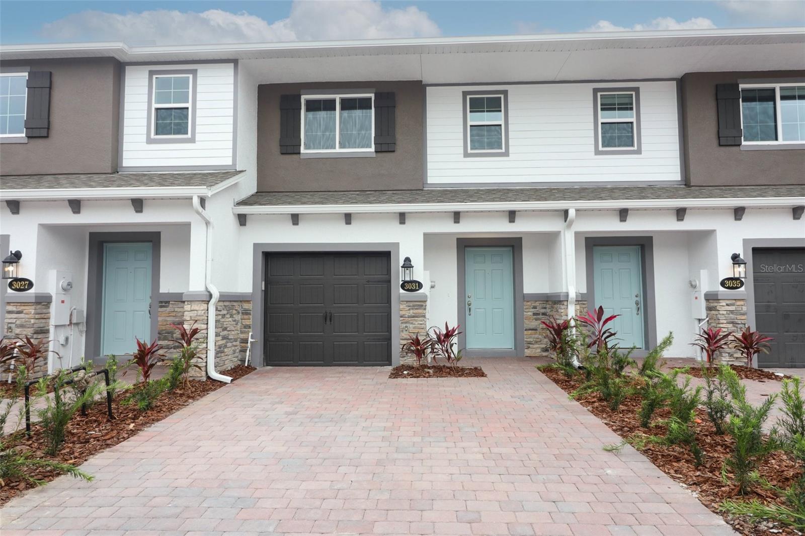 Virtually Staged. Nestled behind the gates of the newest private enclave townhome community in Oviedo, Tuskawilla Commons, an opportunity is ready for you to enjoy maintenance free living and no rear neighbors! Open concept first floor living provides the areas for day to day living and entertainment. An open kitchen design inclusive of all appliances, welcoming island space for seating and dining, pantry cafe, great room, half bathroom & understairs storage. Energy efficient sliding glass doors and windows across the back allow for peaceful views, natural light and cost effective power bills! Second level living provides the space to unwind and retreat for the evenings. The flex area at the stair landing is a fabulous spot for home office, homework stations, etc. The secondary bedrooms and hall bathroom are positioned at the rear wing of the property. The laundry closet, complete with washer, dryer & shelving, is located between the bedroom wings for everyone's convenience! The primary retreat enjoys wall space for your furnishings, a walk-in closet & extended vanity with dual sinks and separate shower stall. Community features include: 2 gated entry/exit points, park with pavilion, bike racks & a pedestrian gate providing seamless access to the Cross Seminole Trail. Located in Seminole County, this prime location is positioned to enjoy quick access to the 417 for all your commuting needs, while surrounded by employment, medical, higher education opportunities, shopping, dining & entertainment opportunities. Schedule your private tour today!