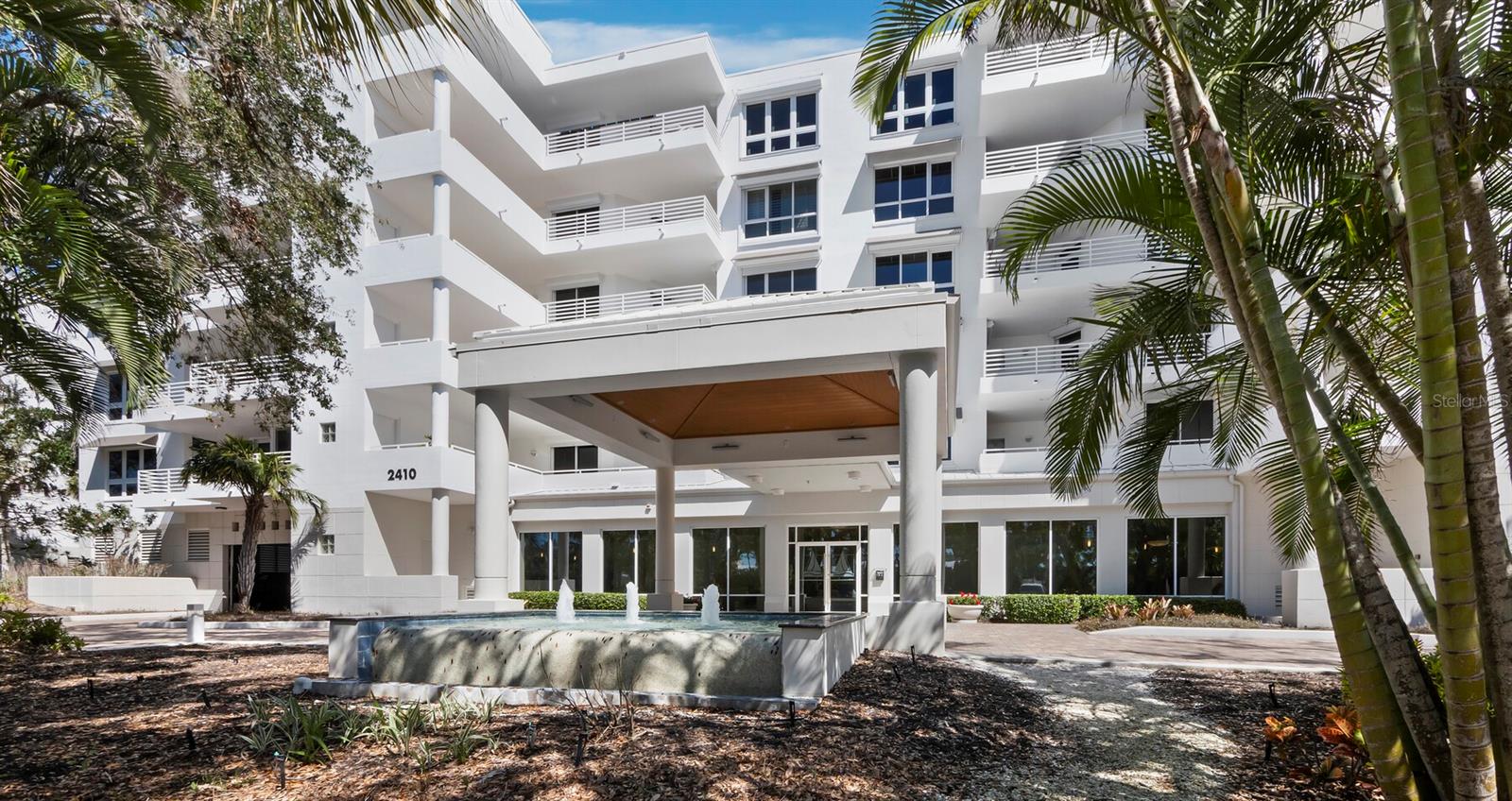This corner 3 BR / 3½ BA + Family Room Penthouse in Marina Bay on Longboat Key offers 3,825 sq. ft. of comfortable living with exceptional views of Sarasota Bay and tropical landscaping. A private elevator opens to a bright, open floor plan with tray ceilings, neutral finishes, and walls of glass that bring the outdoors in. The spacious living room extends to a wrap-around terrace, ideal for dining or relaxing. The formal dining area with wet bar connects to the updated kitchen, featuring custom cabinetry, stone counters, stainless appliances, a center island, and breakfast nook. The split-bedroom layout provides privacy, with a primary suite that includes bay views, terrace access, a custom walk-in closet, and a bath with dual vanities, soaking tub, and glass shower. Two guest suites each have their own baths and generous closets. Marina Bay has new roofs and includes 2 under building parking spaces. Marina Bay offers tennis and pickleball courts, heated pool & spa, on-site management, and 24-hour security. Ownership also includes deeded access to the Bay Isles Beach Club. For those seeking more, optional membership to the Longboat Key Club provides access to championship golf, a world-class marina, tennis, spa, dining, and social amenities.