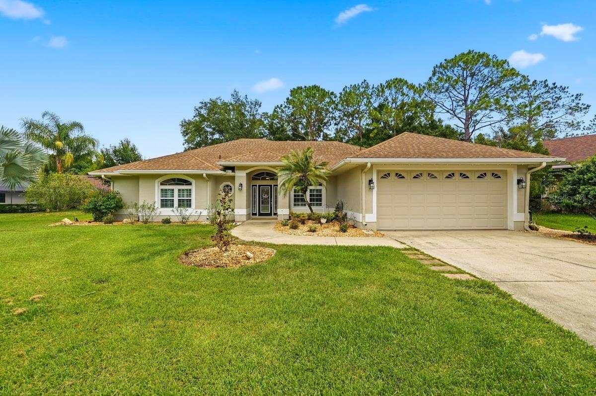 Located on a quiet cut-de-sac in the desirable Plantations part of the guard gated golfing community of Cypresswood Golf & Country Club, this 4BR/3BA beauty w/ more than 2500 sq ft has upgrades galore & is just what you've been looking for!  The home has a fantastic open floor plan w/ split bedrooms, volume ceilings, crown molding, double pane windows, plantation shutters, arched entryways, & super stylish hickory scraped wood looking tile throughout!  The lovely formal dining room w/ it's arched entrances flows nicely just off the foyer, while another arch entry leads straight ahead into the spacious great room w/ a tray ceiling & French doors leading to the inviting Florida room.  The large eat-in-kitchen features beautiful custom maple cabinets w/ pull-outs,  new quartz countertops & tile backsplash, a breakfast bar, soft accent lighting over the cabinets & it comes equipped w/ all of the upgraded appliances including a new stainless steel refrigerator, microwave & gas range, as well as a new kitchen sink & faucet!  The quaint breakfast nook has a beautiful picture window that provides lots of natural light while you're enjoying the serene backyard views.  The primary suite is huge & features a cozy sitting area w/ French doors leading to the Florida rm & there's an ornate barn door entrance leading into the primary bathroom complete w/ a garden tub, nicely tiled step-in shower, double sink vanity w/ quartz countertop & a walk-in closet.  The 2nd & 3rd BR's are situated on the other side of the living areas for added privacy & they have  a Jack-n-Jill bath between them that has  a double sink vanity w/ quartz countertop as well as a tub & shower combo.  The 4th BR is located just down the hall from the Primary bedroom making it a nice option for a nursery/small child's room or an office.  It would also be a nice guest room w/ the 3rd bathroom conveniently located right beside it w/ quartz countertop & a step-in shower w/ a nice glass enclosure.  The large Florida rm has lots of windows overlooking the landscaped back yard & it even has a wet bar complete w/ mini fridge, a wine fridge & of course ...quartz countertops making it the perfect spot for entertaining.   Additional features include an inside laundry room, a double car garage, fairly new C/H/A, a whole house gas generator, a water softner/purificiation system, central vac, & there's even a fire pit in the back yard on this 1/3+ acre property tucked away in Cypresswood Golf & Country Club, with lots of community amenities including a 24 hour manned gated entrance, a community pool for you to enjoy & not have to maintain, plus there's pickleball courts, tennis courts, a large clubhouse w/ fitness center, restaurant, pro shop & surrounded by the lovely golf course!  Close to shopping, restaurants, medical, the new Publix, Legoland & more & Conveniently located in the heart of Central Florida between Orlando & Tamps and not far from all of the major attractions.  All measurements are approximate and all info should be confirmed by buyers.